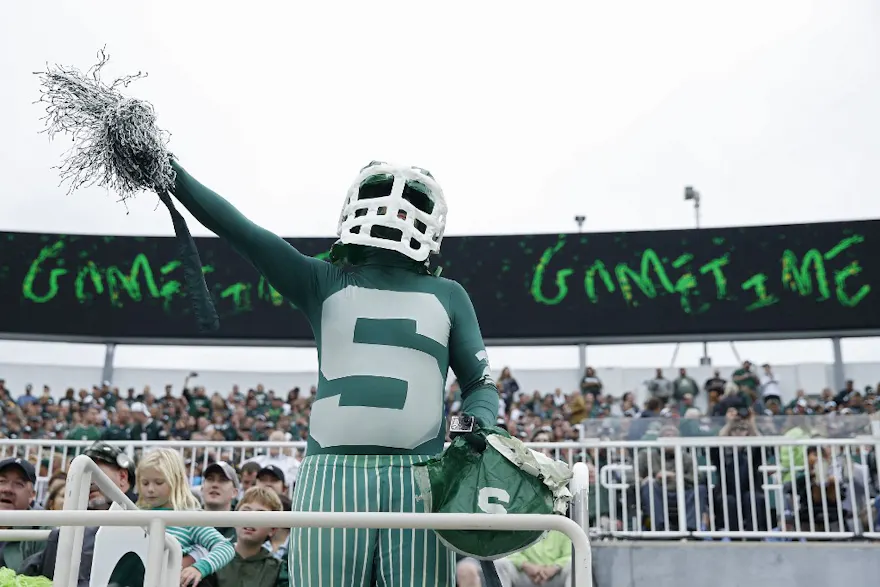 Michigan State Spartans fan gets ready at the start of the game against the Indiana Hoosiers at Spartan Stadium. Photo by Joe Robbins/Getty Images via AFP.