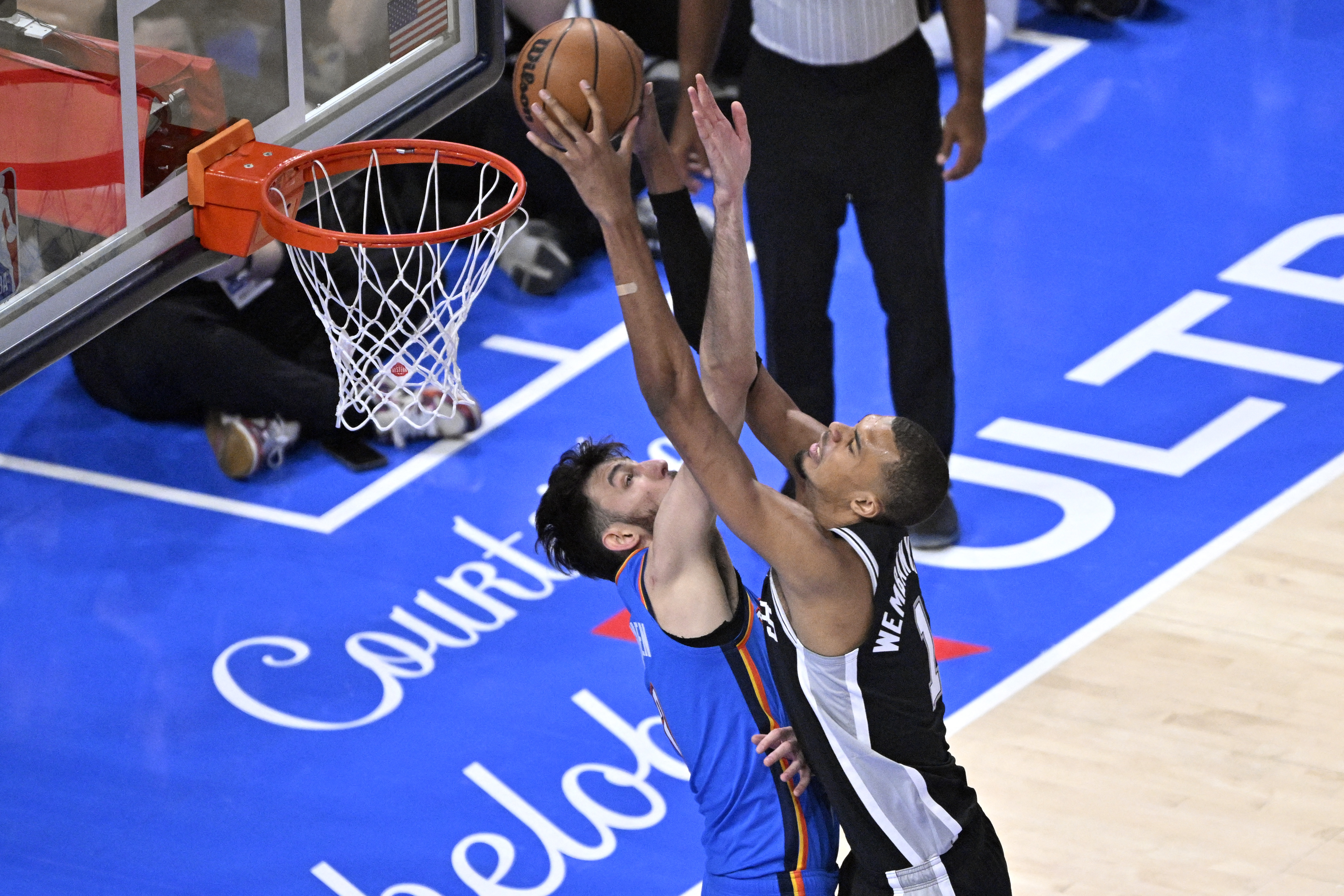 San Antonio Spurs center Victor Wembanyama (1) shoots against Oklahoma City Thunder center Chet Holmgren (7) as we offer our NBA best bets today.