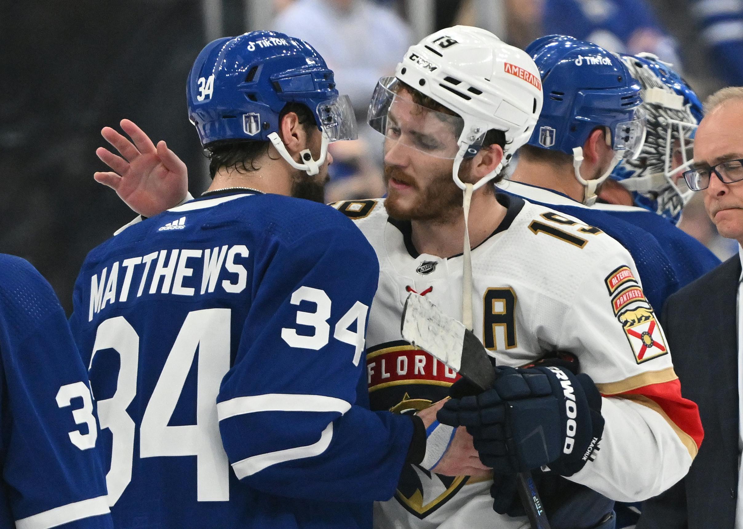 Toronto Maple Leafs forward Auston Matthews congratulates Florida Panthers forward Matthew Tkachuk