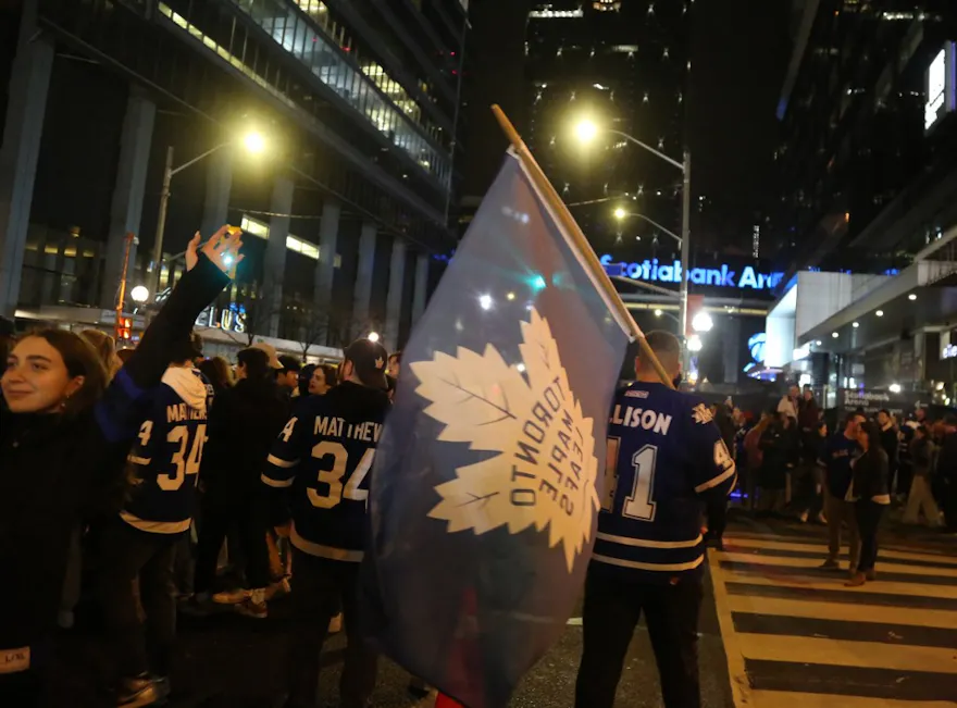 Toronto Maple Leafs fans celebrate in downtown Toronto as we look at the odds for the Maple Leafs' next GM.
