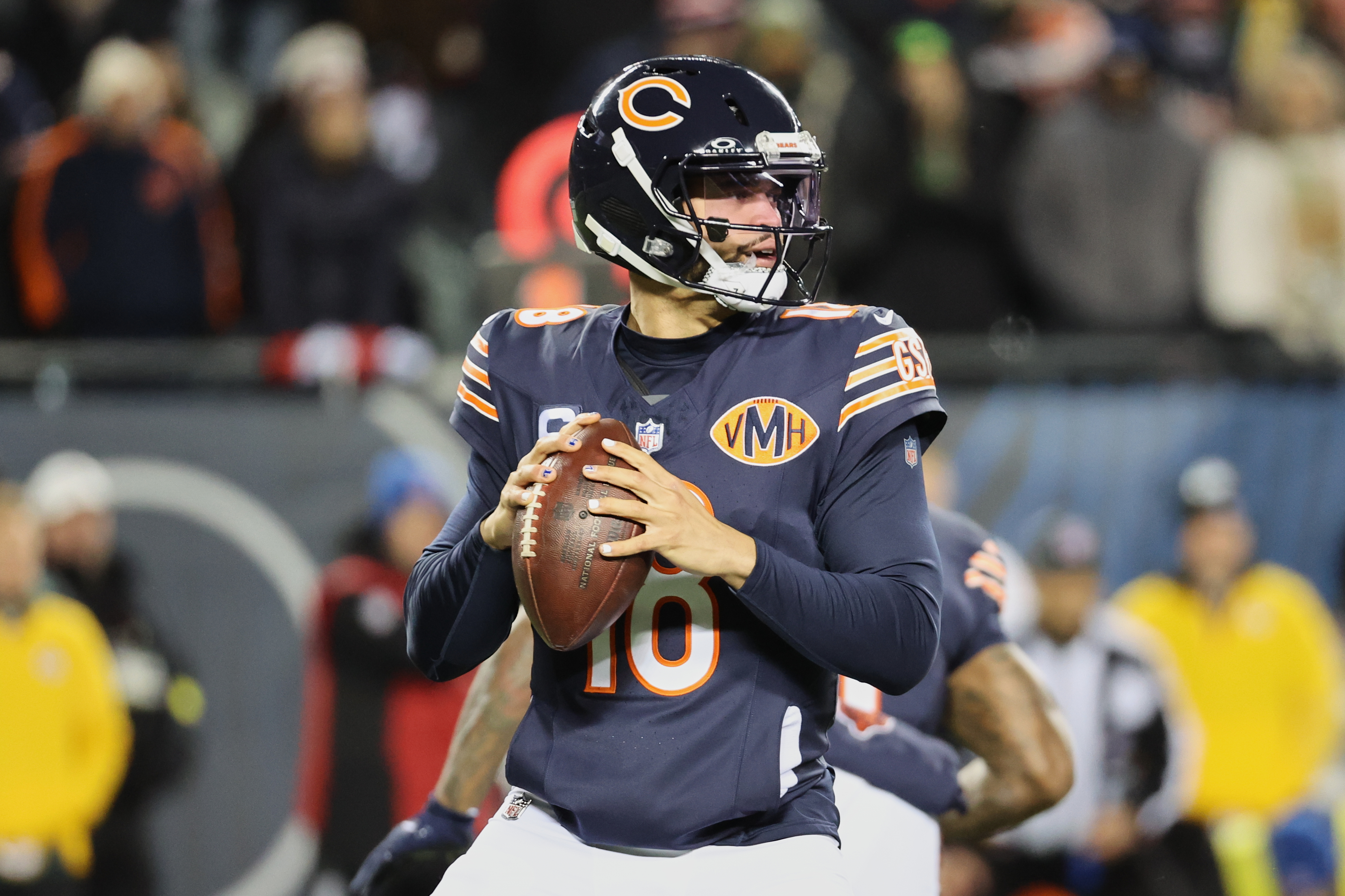Chicago Bears quarterback Caleb Williams (18) looks to throw as we offer our Bears vs. 49ers predictions.