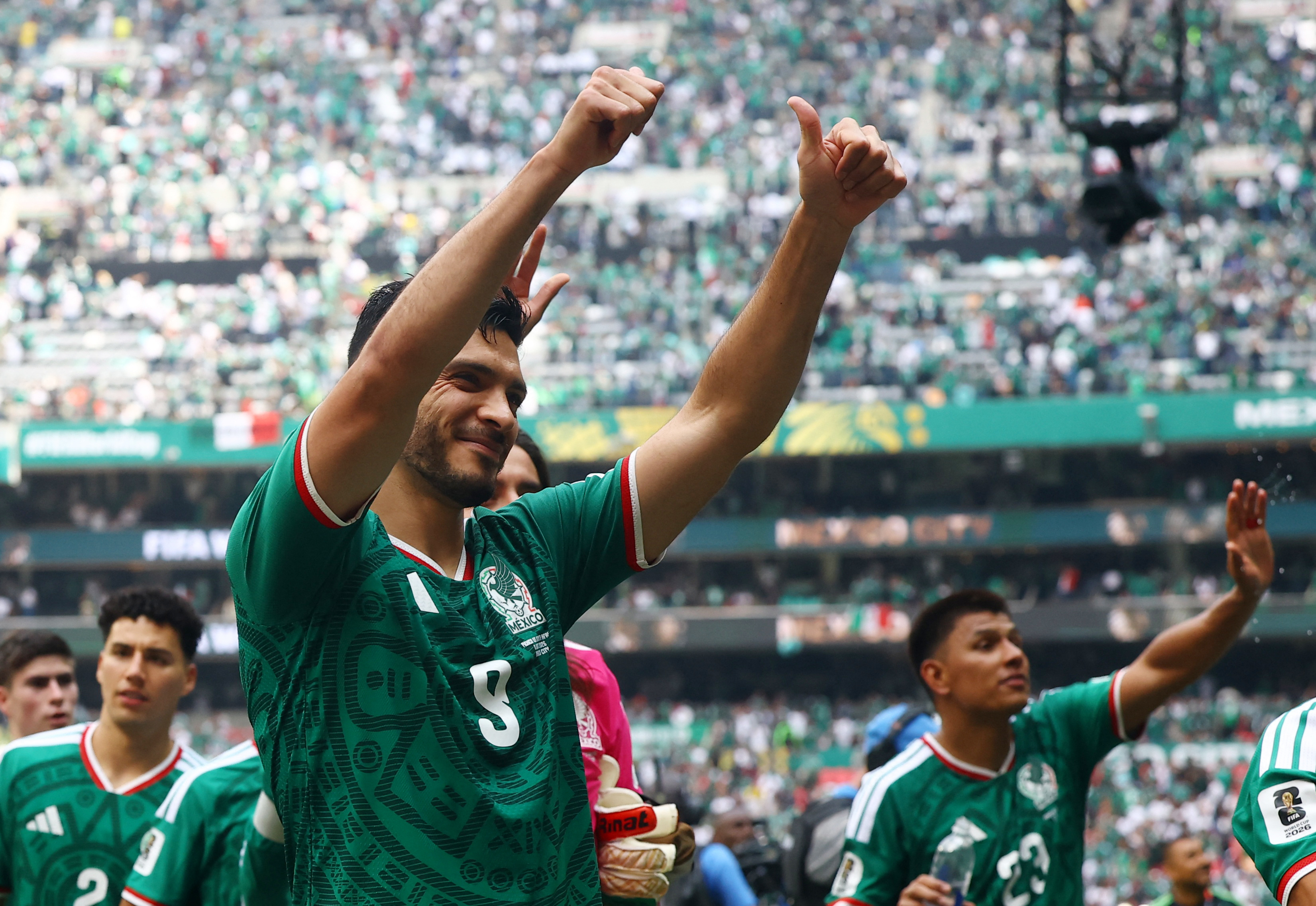 Mexico's Raul Jimenez celebrates as we make our best Mexico vs. South Korea prediction.