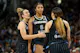 Marina Mabrey (4) holds back Angel Reese (5) as we offer our best Aces vs. Sky prediction and expert picks for Thursday's WNBA matchup at Wintrust Arena in Chicago.