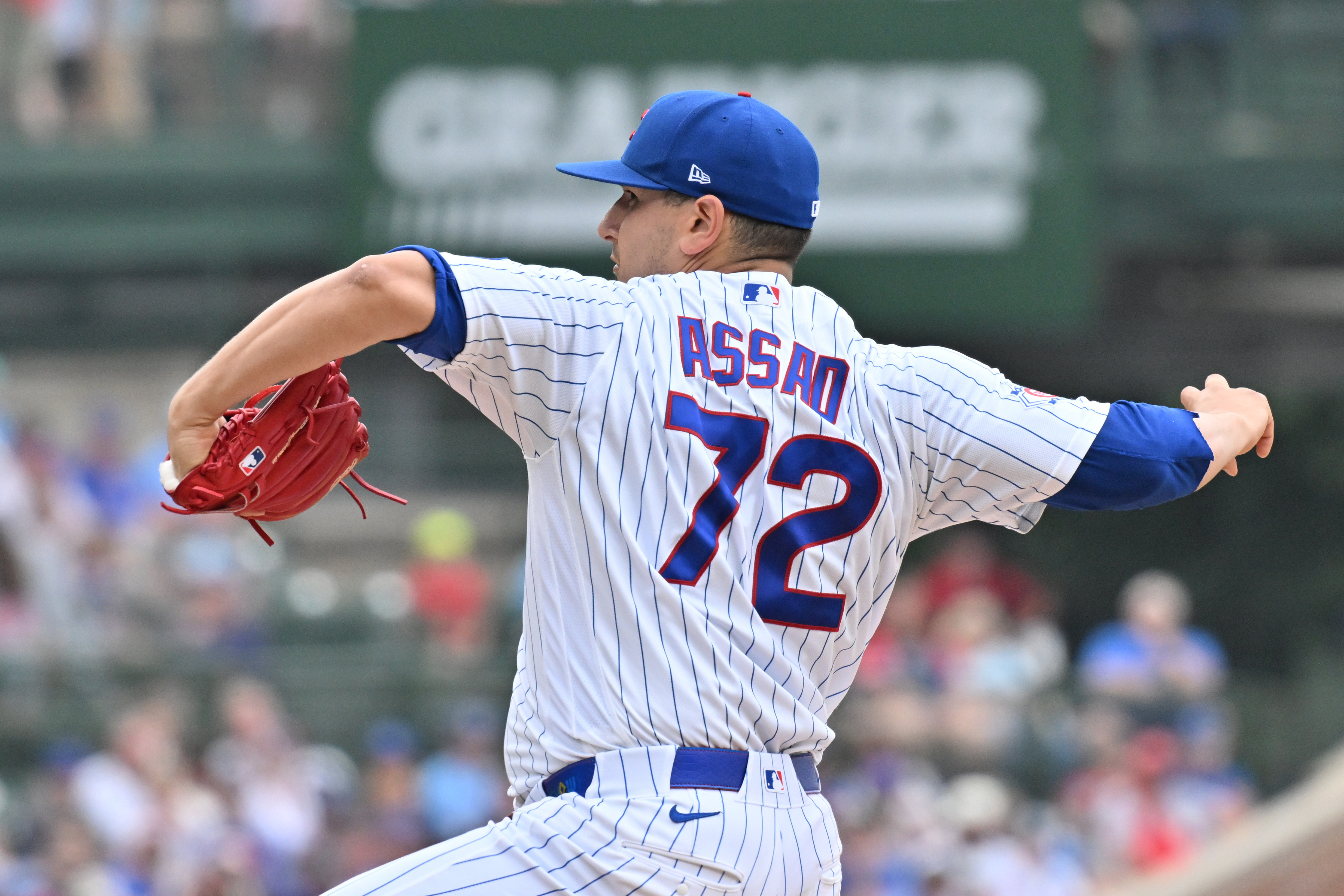 Chicago Cubs pitcher Javier Assad (72) pitches as he is featured on our Cubs vs. Reds win probability.