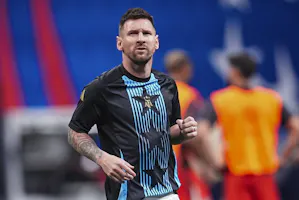 Argentina forward Lionel Messi warms up before the match against Canada at Mercedez-Benz Stadium as we look at our Chile vs. Argentina prediction.