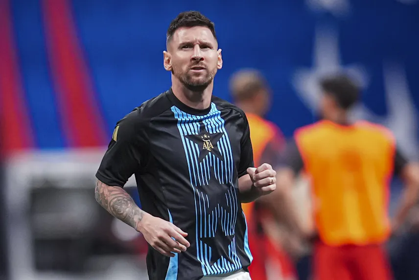 Argentina forward Lionel Messi warms up before the match against Canada at Mercedez-Benz Stadium as we look at our Chile vs. Argentina prediction.
