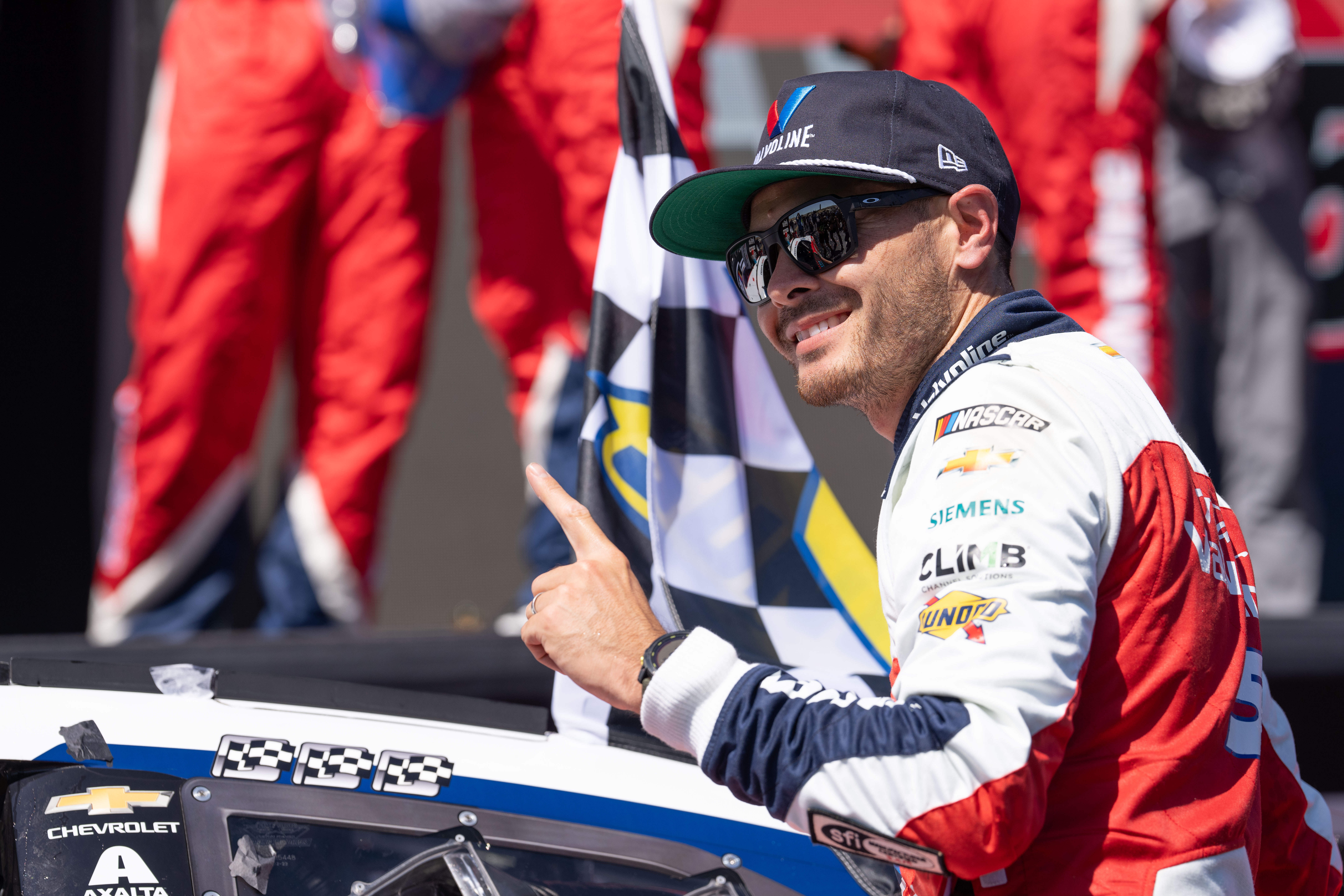 NASCAR Cup Series driver Kyle Larson celebrates as we look at the Iowa Corn 350 odds and picks for Sunday