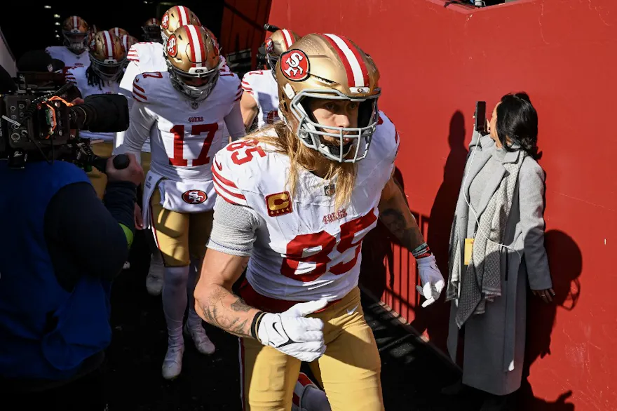 George Kittle of the San Francisco 49ers takes the field prior to a game against the Washington Commanders as we look at our Chiefs-49ers promo code for BetRivers.