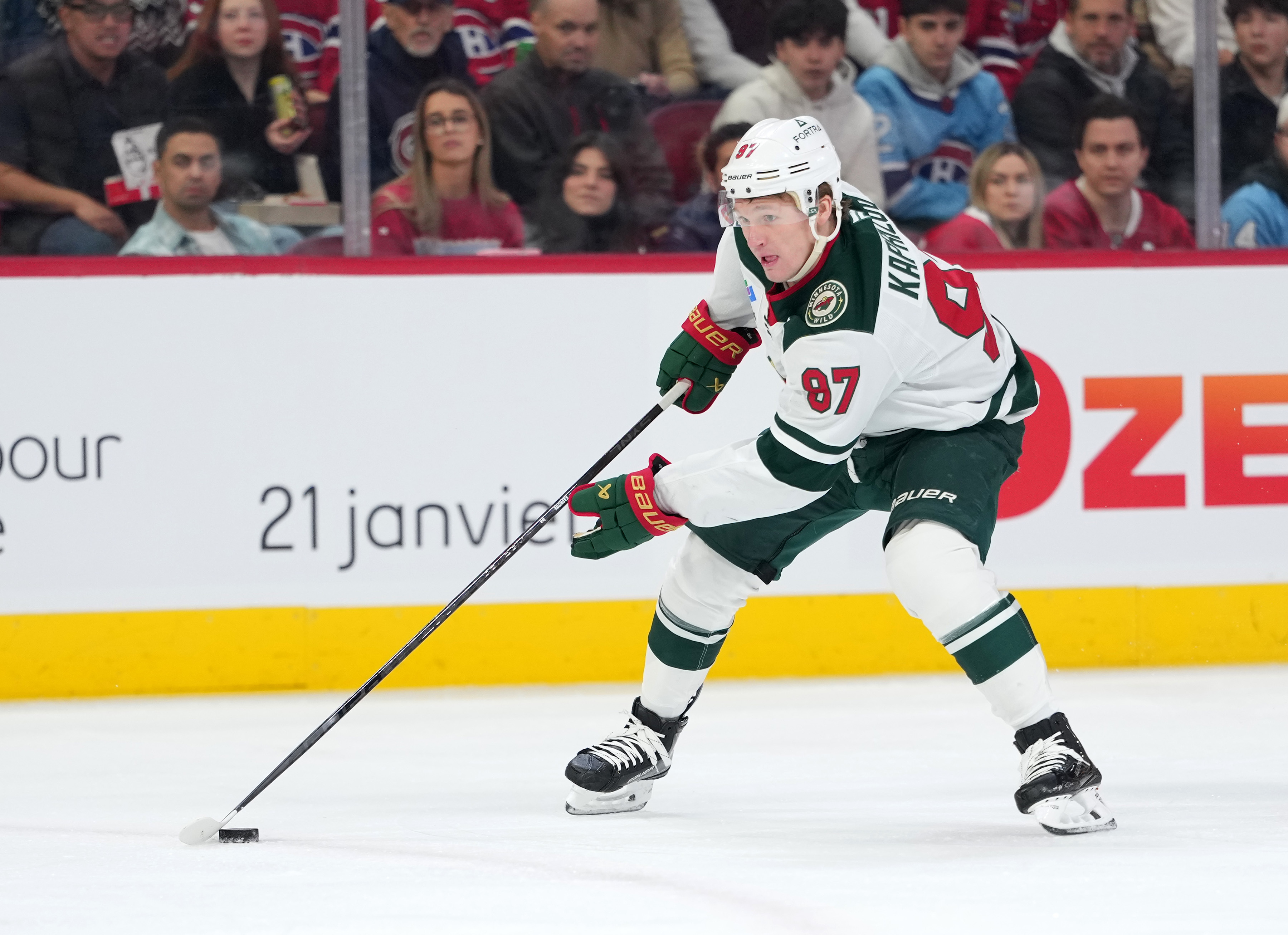 Minnesota Wild forward Kirill Kaprizov plays the puck as we offer our Red Wings vs. Wild prediction and best bets. 