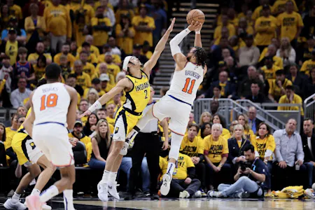 Jalen Brunson (11) of the New York Knicks shoots the ball against Andrew Nembhard (2) of the Indiana Pacers, as we offer our best Knicks vs. Pacers player props for Sunday's Game 4 at Gainbridge Fieldhouse in Indianapolis.