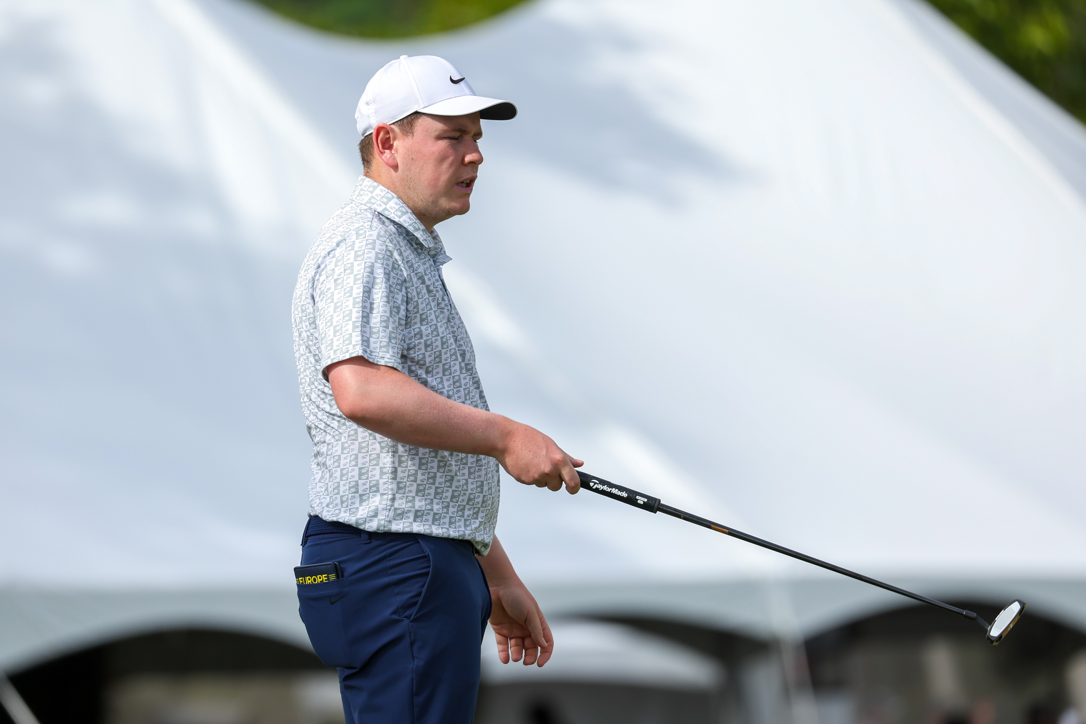 Robert MacIntyre, of Scotland, reacts to his putt on the 16th green as we break down our AT&T Pebble Beach Pro-Am long shot picks & sleepers.