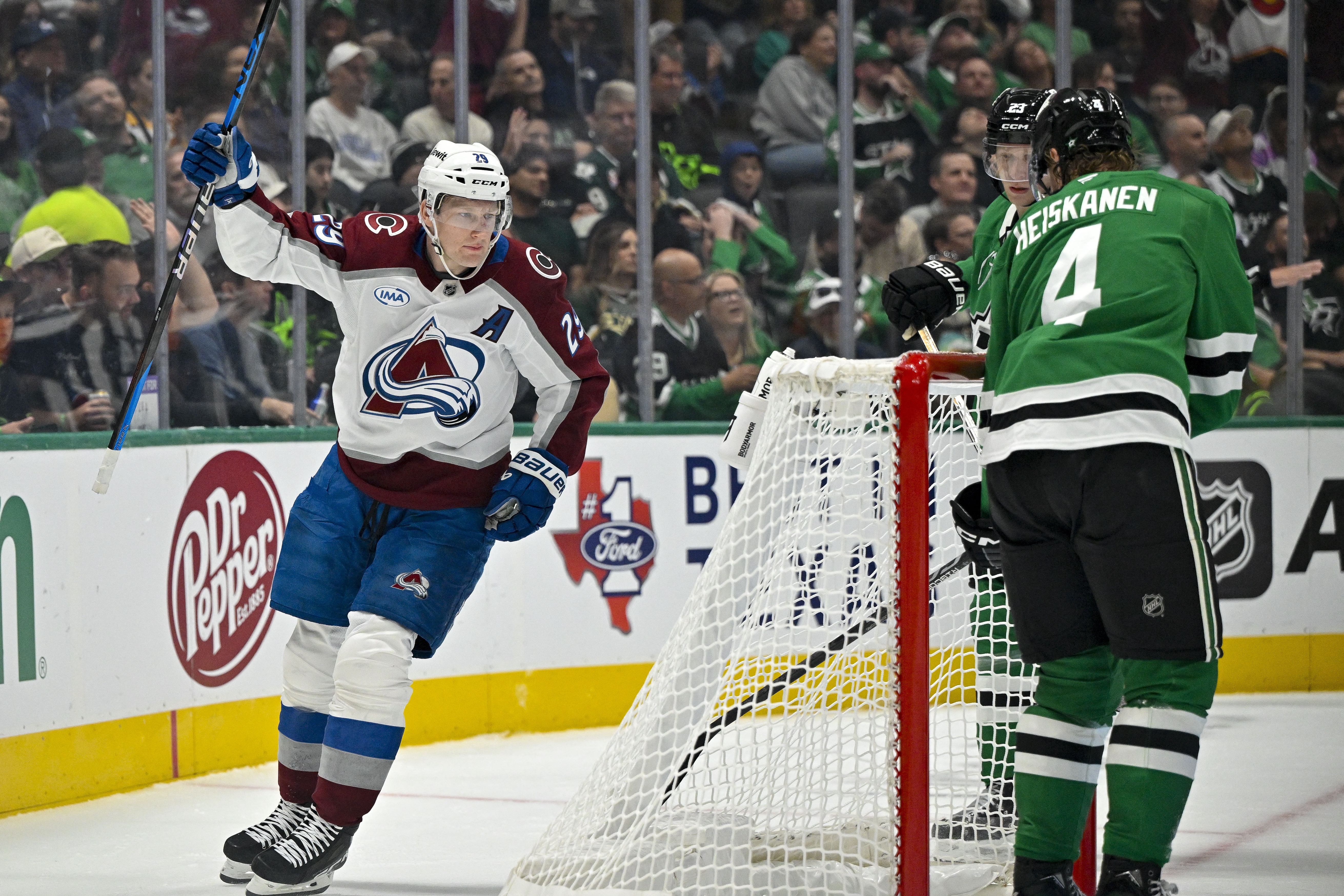 Colorado Avalanche center Nathan MacKinnon (29) celebrates his team's goal as we provide our Stars vs. Avalanche prediction.