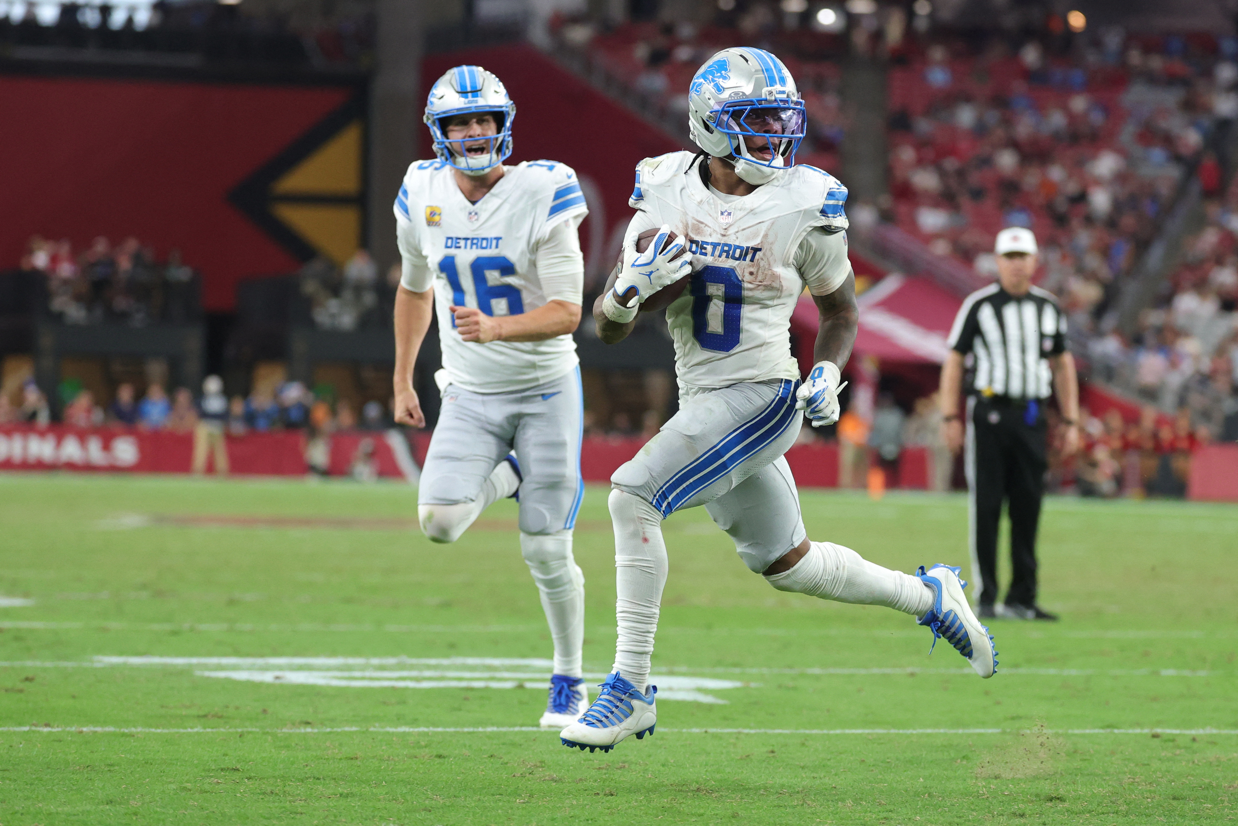 Detroit Lions running back Jahmyr Gibbs (0) carries the ball for a touchdown against the Arizona Cardinals as we look at the NFL Offensive Player of the Year odds. 