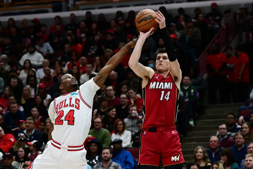 Tyler Herro of the Miami Heat shoots a three point basket in the first half against the Chicago Bulls at United Center. We're backing Herro in our Bulls vs. Heat player props & odds. 