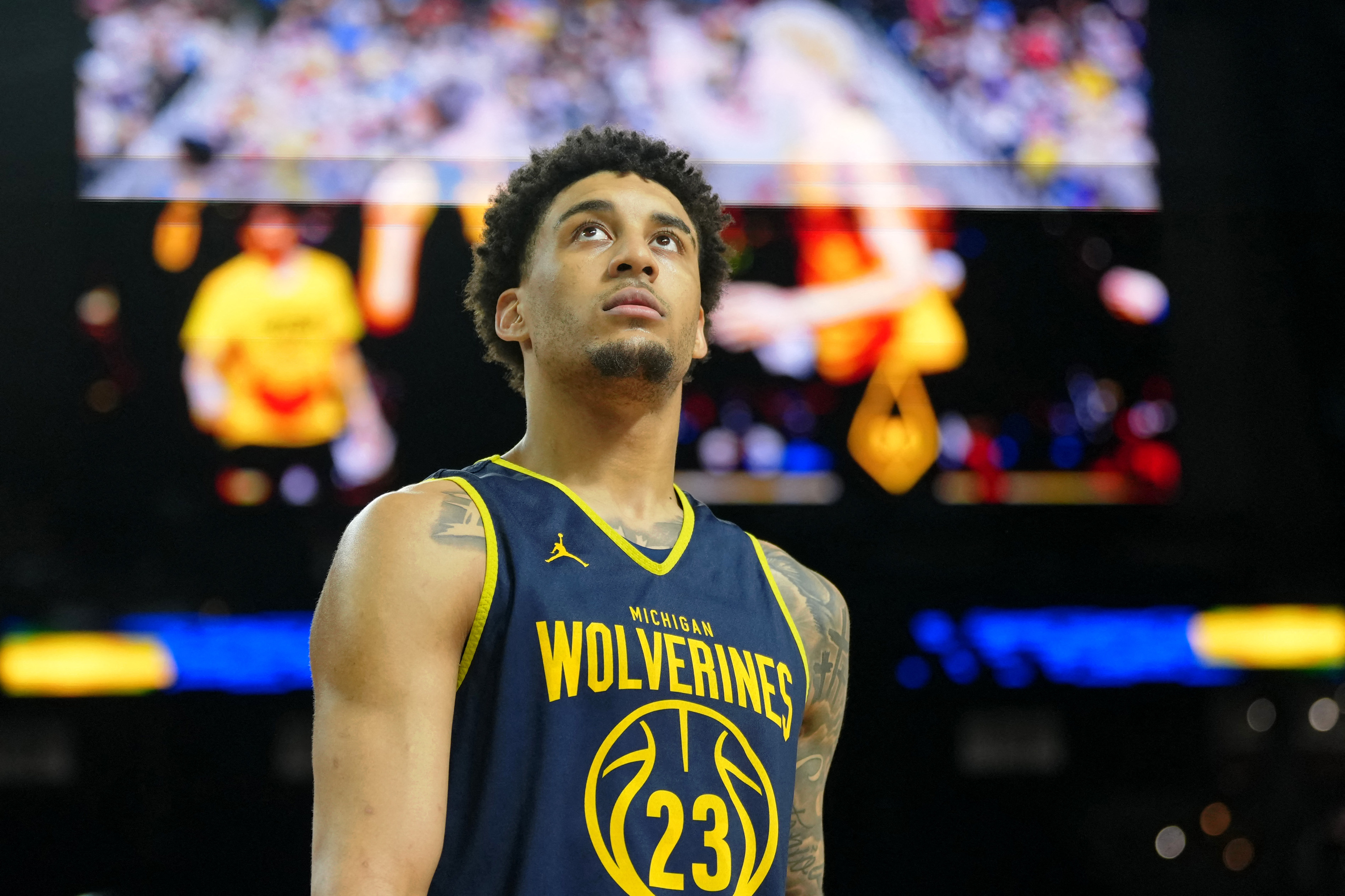 Michigan Wolverines forward Yaxel Lendeborg (23) looks on as we break down our Michigan vs. Arizona prediction.