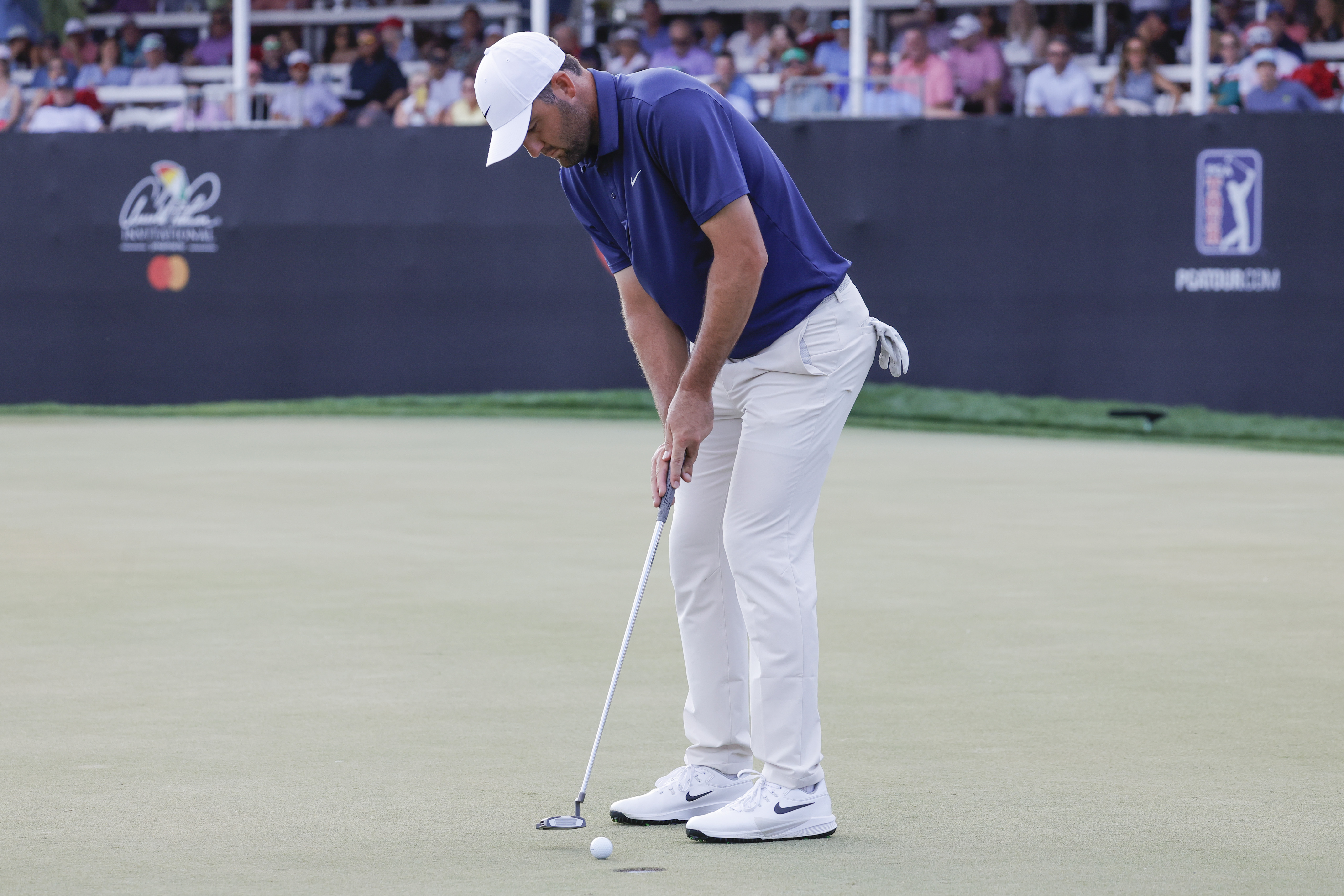 Scottie Scheffler rolls a putt on the 17th green during the third round of the Arnold Palmer Invitational golf tournament at Bay Hill as we look at the 2026 Arnold Palmer Invitational odd