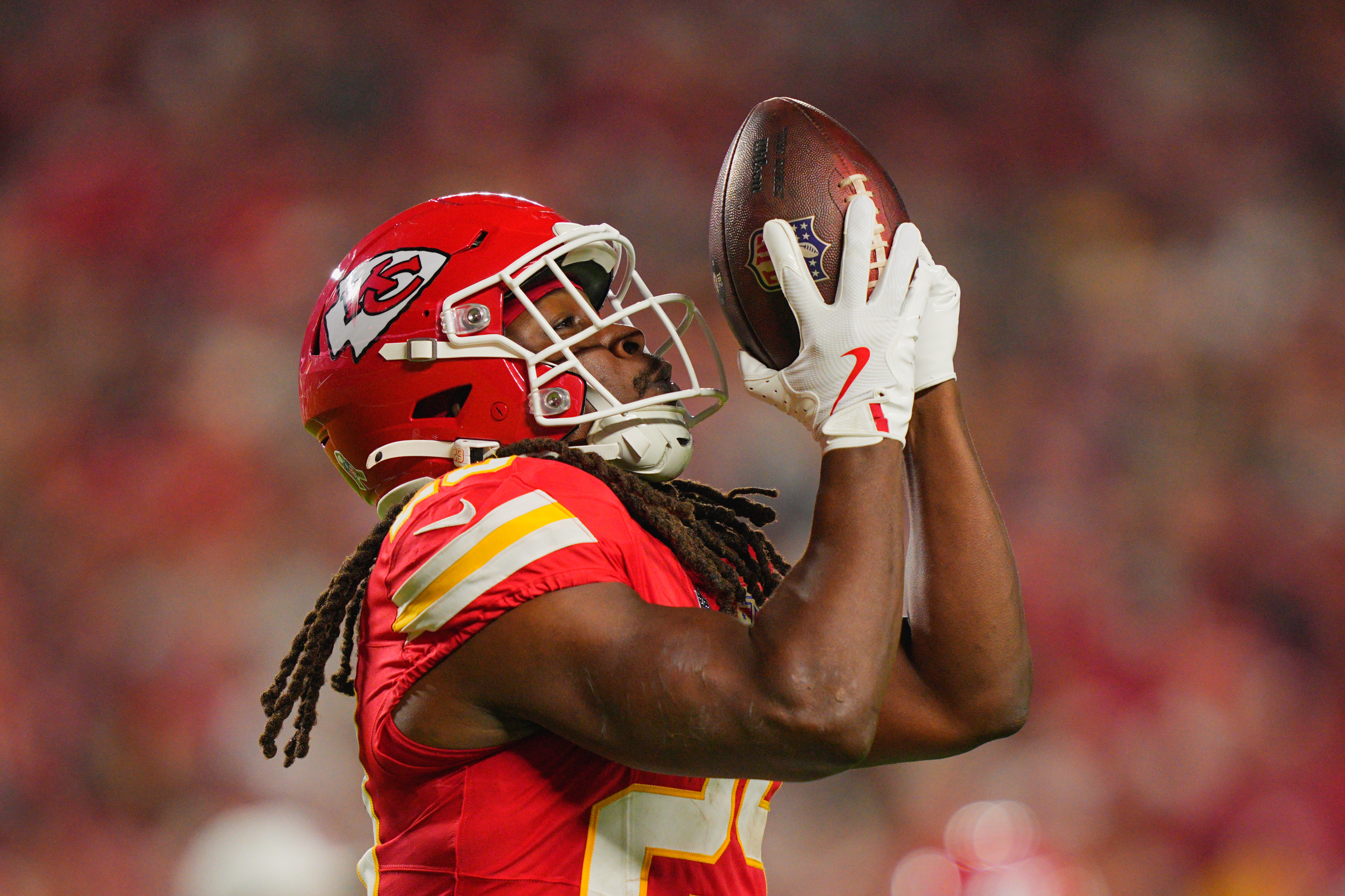 Kansas City Chiefs running back Kareem Hunt celebrates after scoring a touchdown as we offer our best Chiefs vs. Titans player props