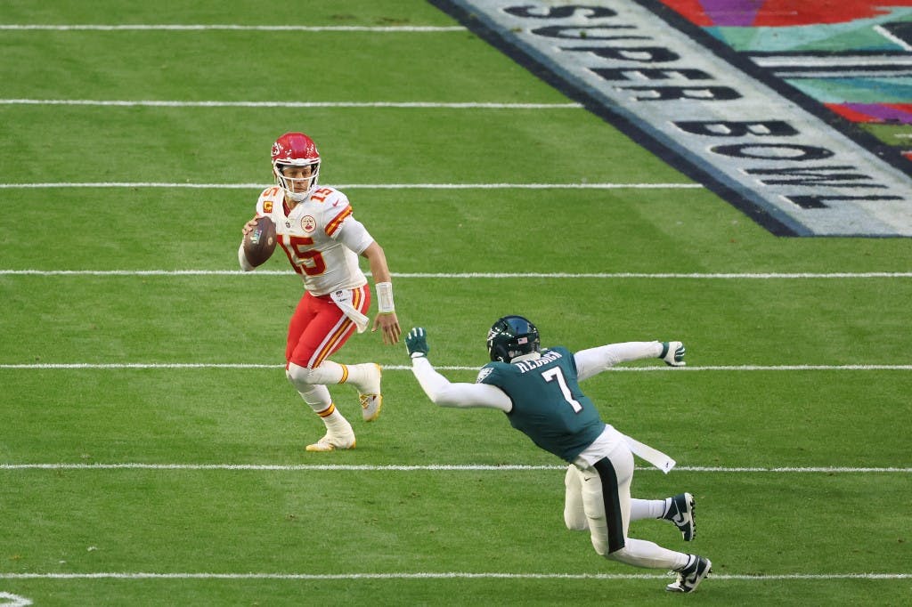 GLENDALE, ARIZONA - FEBRUARY 12: Patrick Mahomes #15 of the Kansas City Chiefs looks to pass against the Philadelphia Eagles during the first quarter in Super Bowl LVII at State Farm Stadium on February 12, 2023 in Glendale, Arizona.