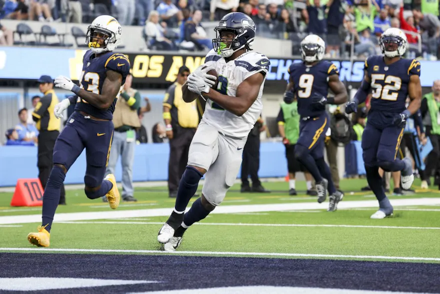 Kenneth Walker III of the Seattle Seahawks scores a touchdown against the Los Angeles Chargers at SoFi Stadium on Oct. 23, 2022 in Inglewood, California.   Photo by Harry How/Getty Images via AFP. 