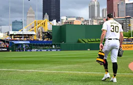 Paul Skenes of the Pittsburgh Pirates walks to the bullpen to warm up before making his major-league debut, and we look at the best MLB futures bets to consider for Skenes during his rookie season.