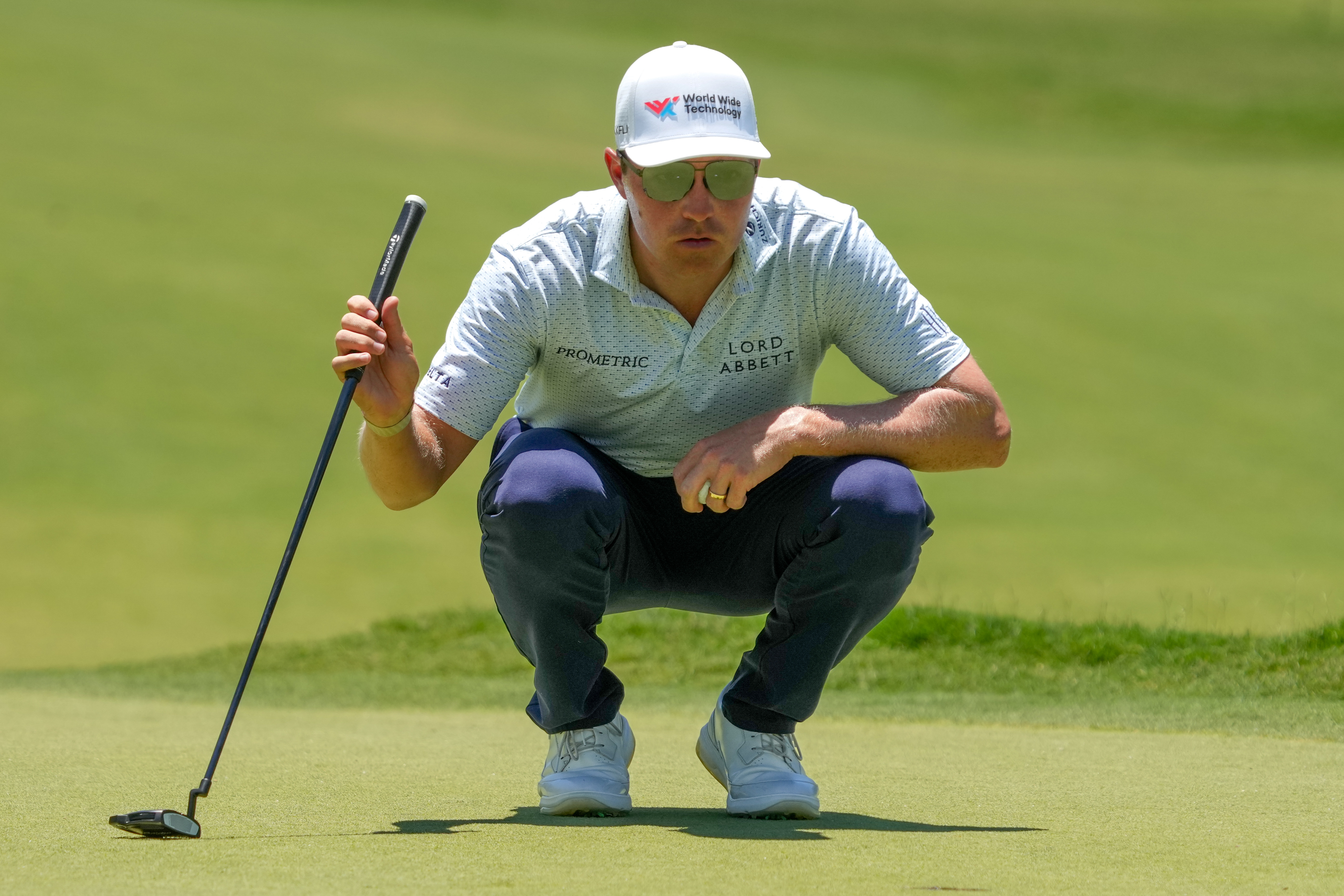 Ben Griffin lines up a putt on the 11th green as he is featured in our John Deere Classic odds, favorite & pick to win.