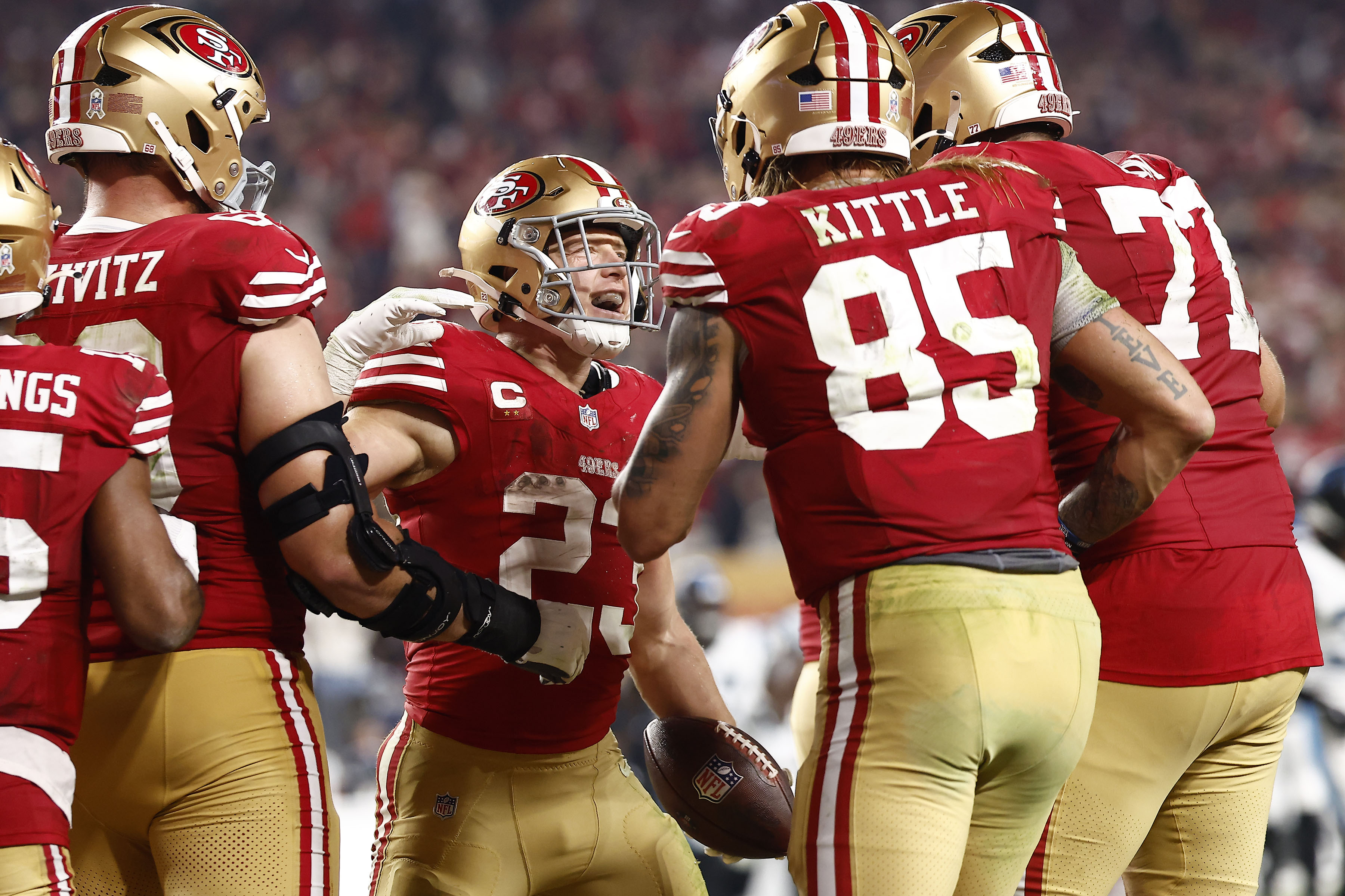 San Francisco 49ers running back Christian McCaffrey (23) reacts after scoring a touchdown.