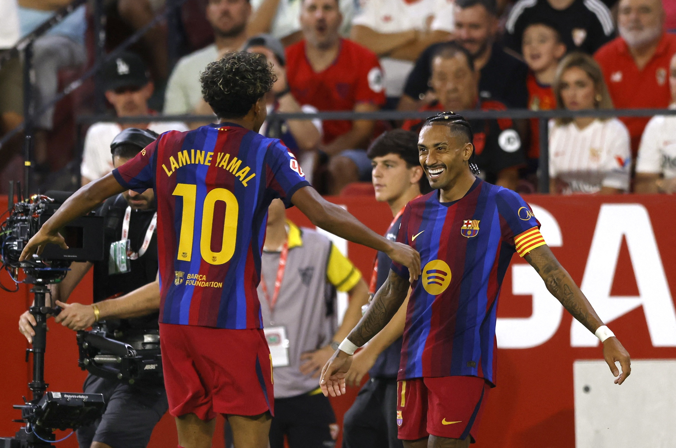 Pictured: Lamine Yamal and Raphinha celebrating as we break down our Barcelona vs. Real Madrid Prediction. Photo by REUTERS/Marcelo Del Pozo.