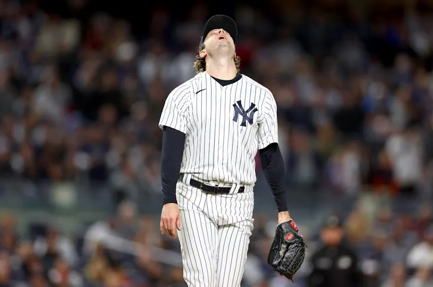 Gerrit Cole of the New York Yankees reacts after giving up a three-run home run to Alex Verdugo of the Boston Red Sox in the sixth inning at Yankee Stadium on September 23, 2022.