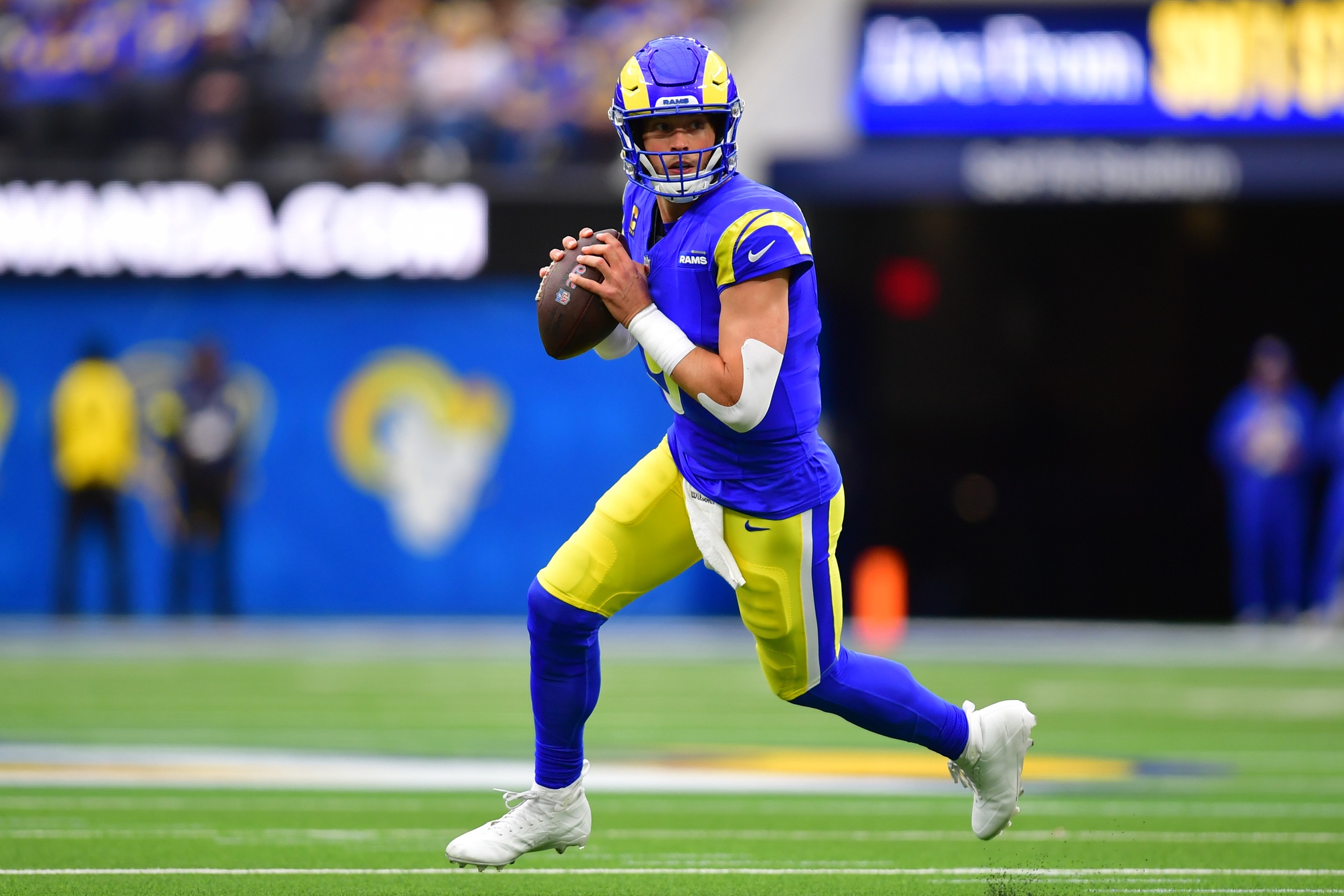 Los Angeles Rams quarterback Matthew Stafford rolls out, and he's key as we look at our NFL playoff QB rankings