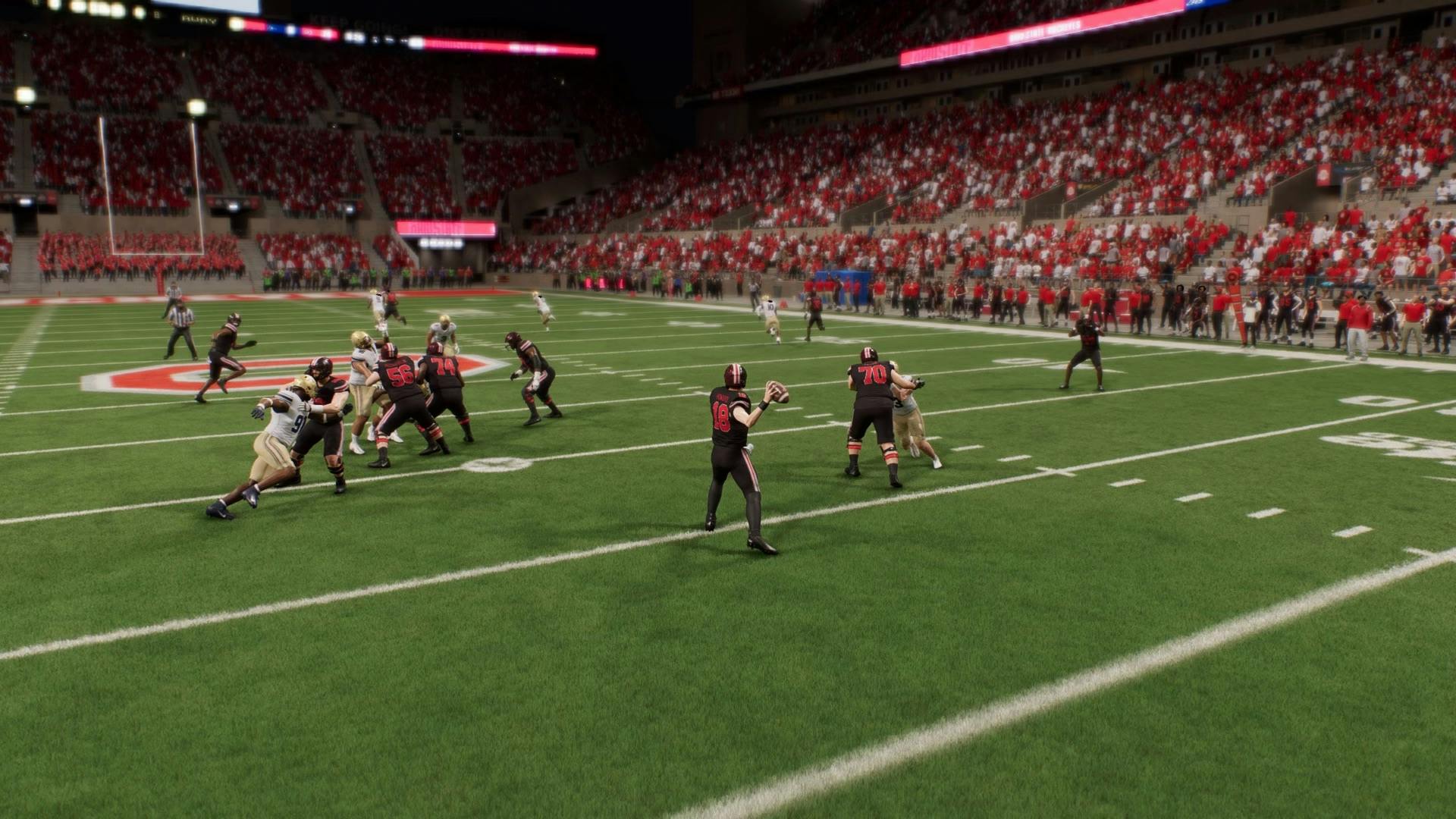 Ohio State QB Will Howard loading up to hit TreVeyon Henderson on the wheel route to complete the 70-burger against Akron. Screenshot via EA Sports College Football 25.