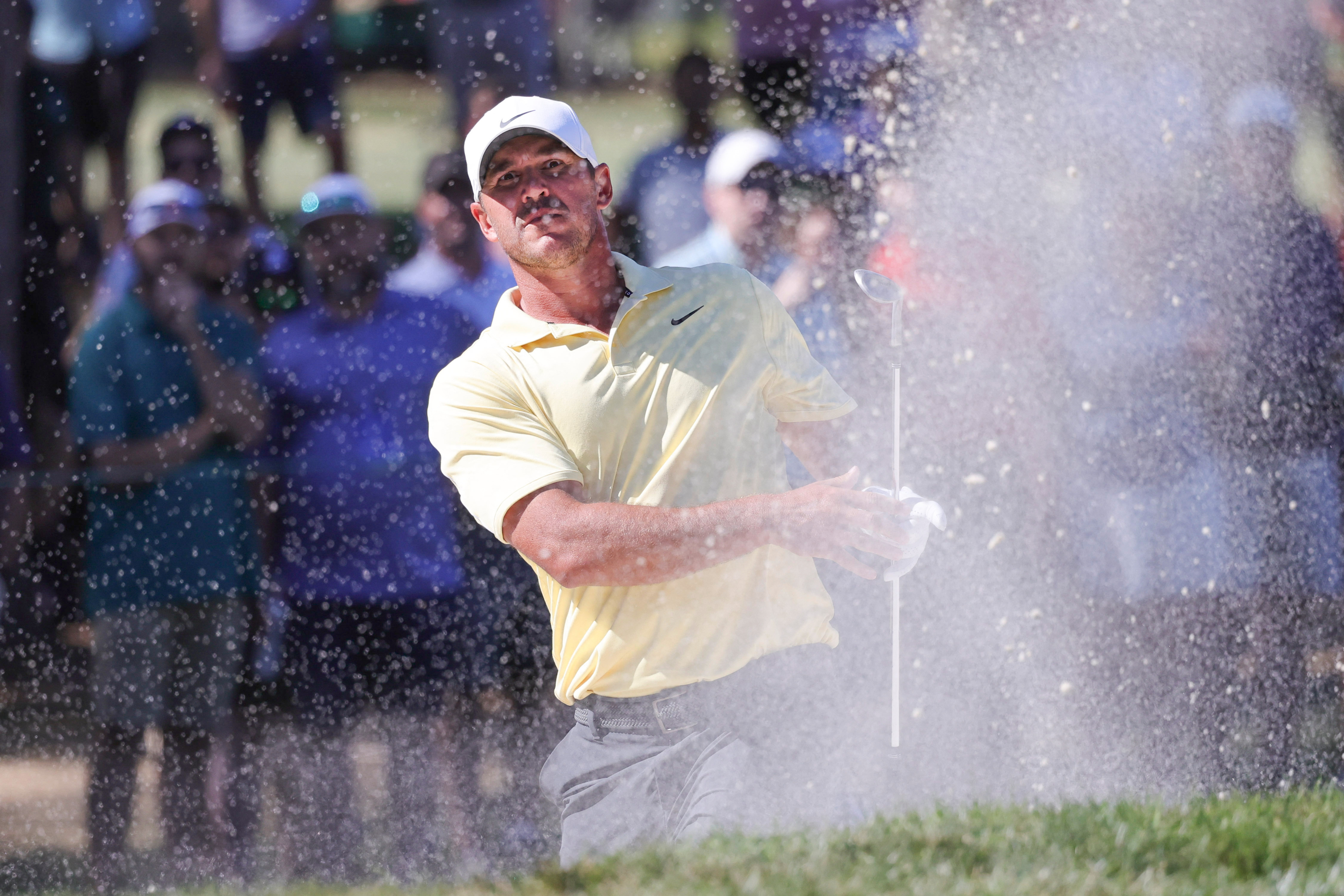 Brooks Koepka plays a shot from a bunker as we look at the Texas Children's Houston Open odds