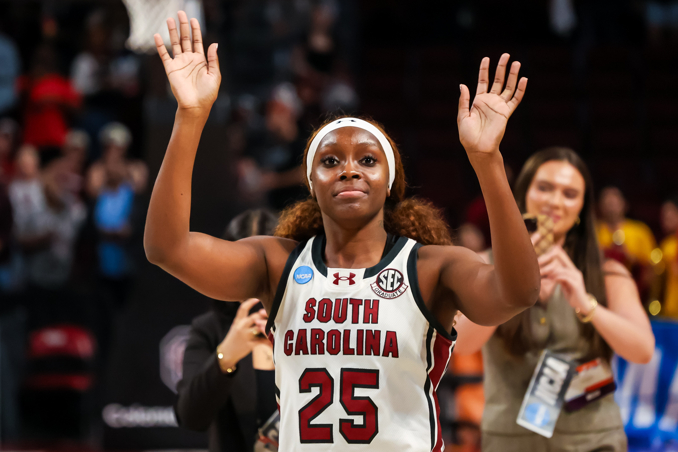 Senior South Carolina Gamecocks guard Raven Johnson waves to the crowd as we make our best TCU vs. South Carolina prediction & parlay.