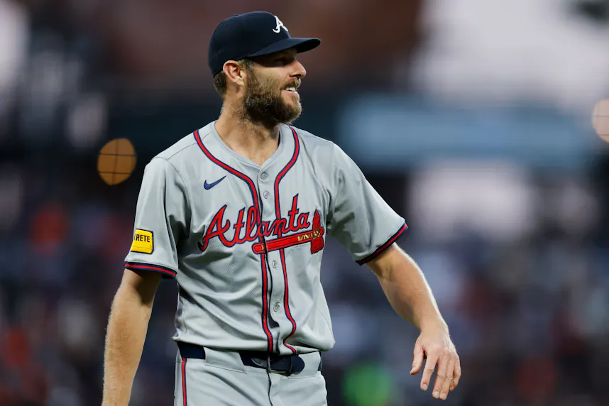Atlanta Braves pitcher Chris Sale smiles after catching a line drive against the San Francisco Giants.