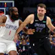 James Harden of the LA Clippers guards Luka Doncic of the Dallas Mavericks as he drives the ball past in the first half of a game at American Airlines Center. We're backing Doncic in our Mavericks vs. Clippers player props & odds. 