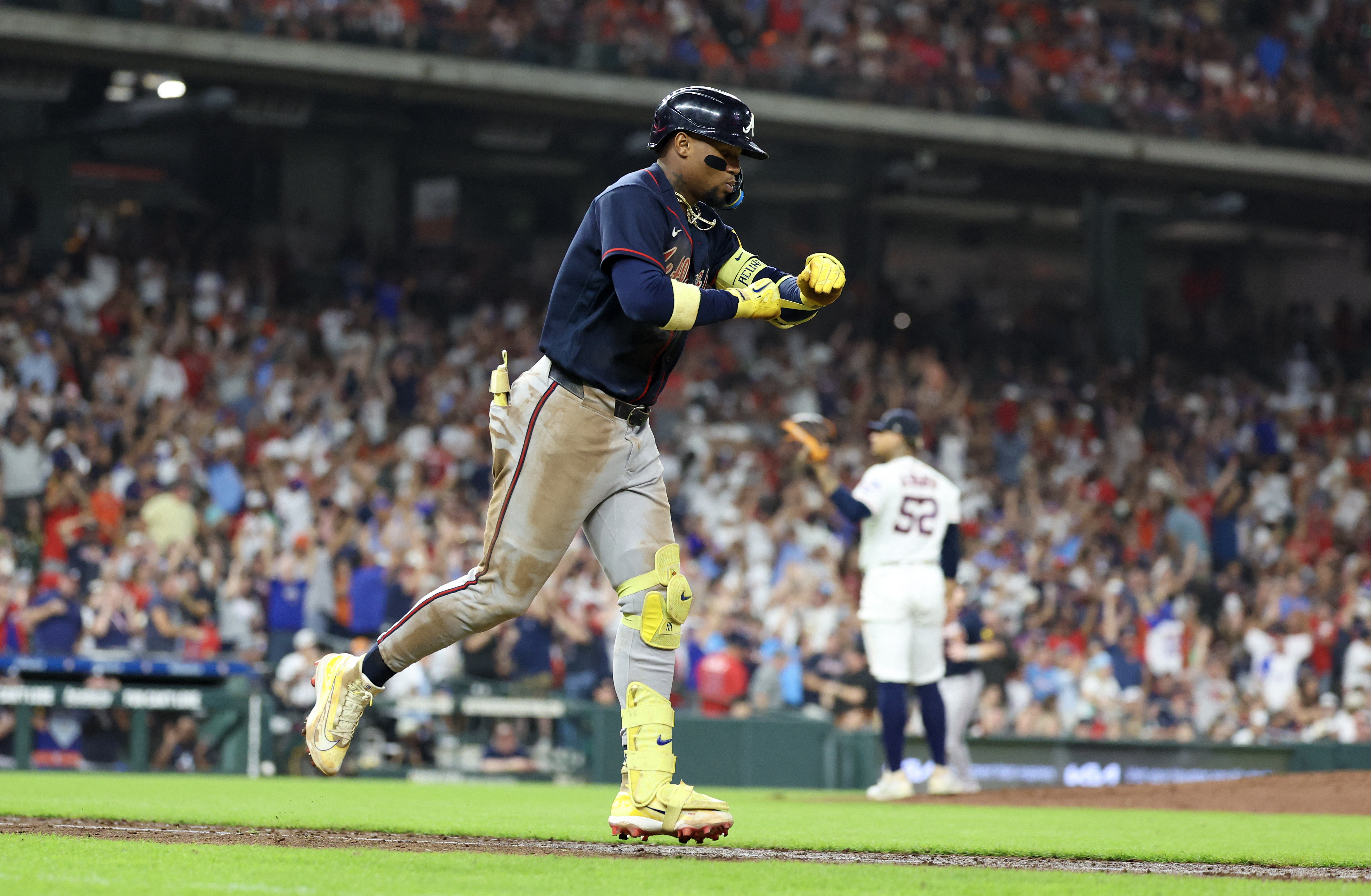 Atlanta Braves right fielder Ronald Acuna Jr. (13) reacts as he is featured in our MLB best home run predictions today.