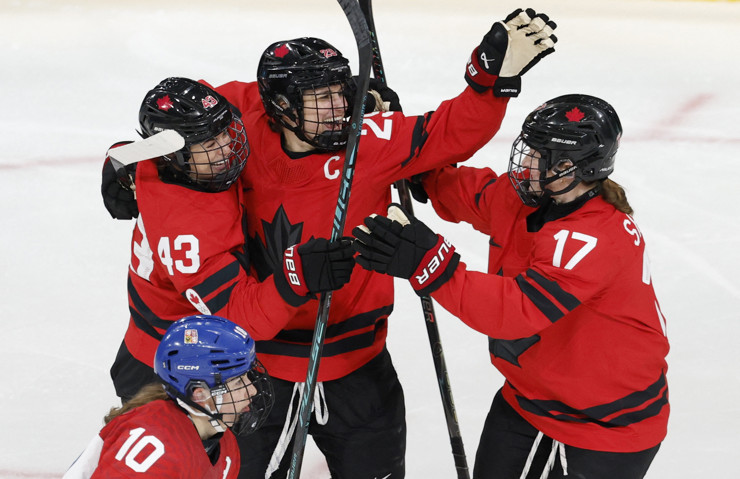 Kristin O'Neill celebrates a goal with Marie-Philip Poulin and Ella Shelton as we provide our Canada vs. Switzerland prediction and best bets. 