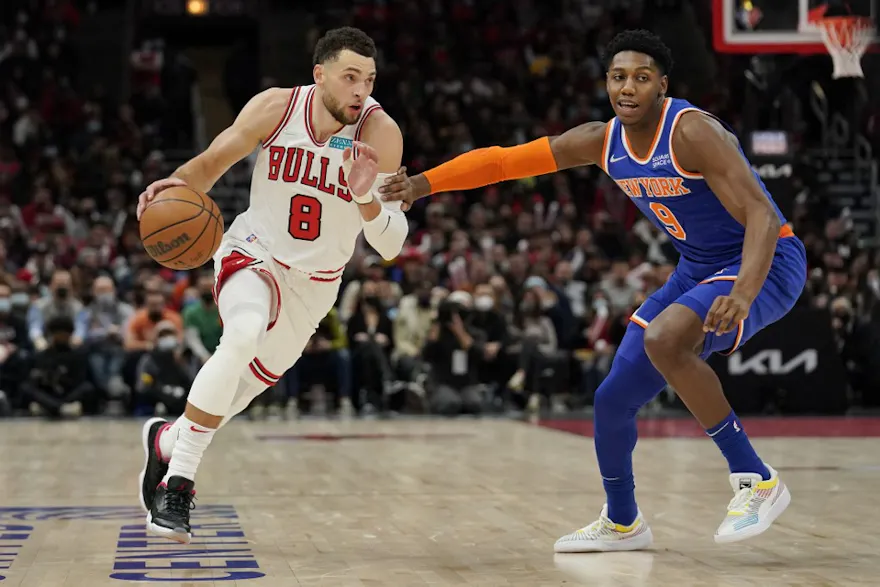 Zach LaVine of the Chicago Bulls dribbles the ball against RJ Barrett of the New York Knicks.