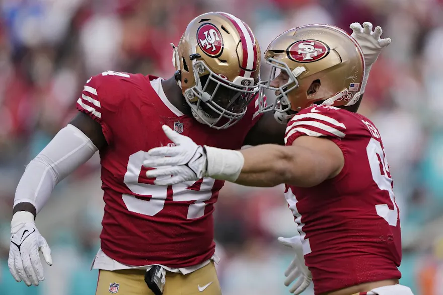 Nick Bosa of the San Francisco 49ers and Charles Omenihu of the San Francisco 49ers celebrate after Bosa's sack during the first quarter against the Miami Dolphins at Levi's Stadium on Dec. 04, 2022. Photo by Thearon W. Henderson Getty Images via AFP.