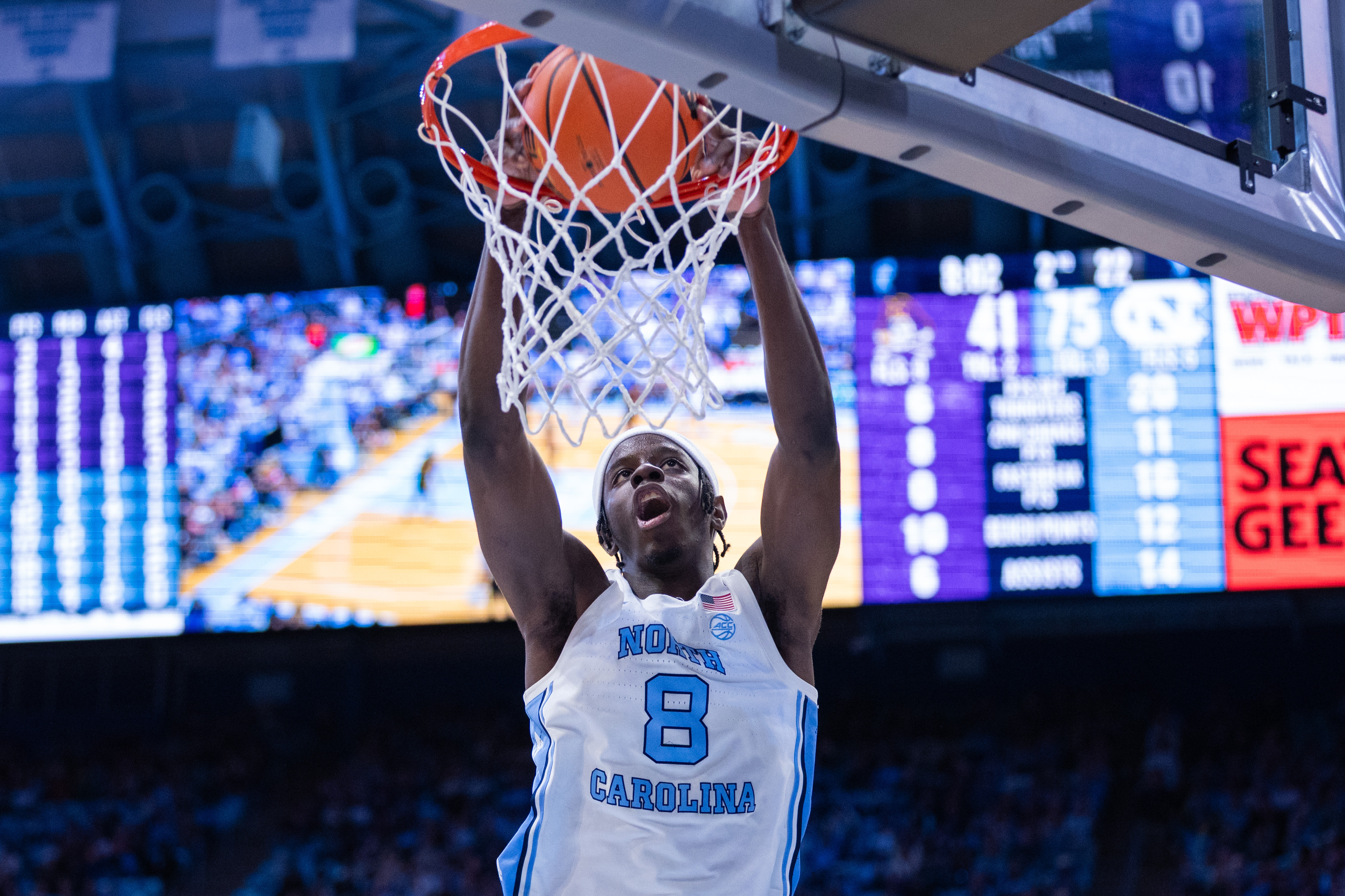 North Carolina Tar Heels forward Caleb Wilson dunks as we make our college basketball best bets today.