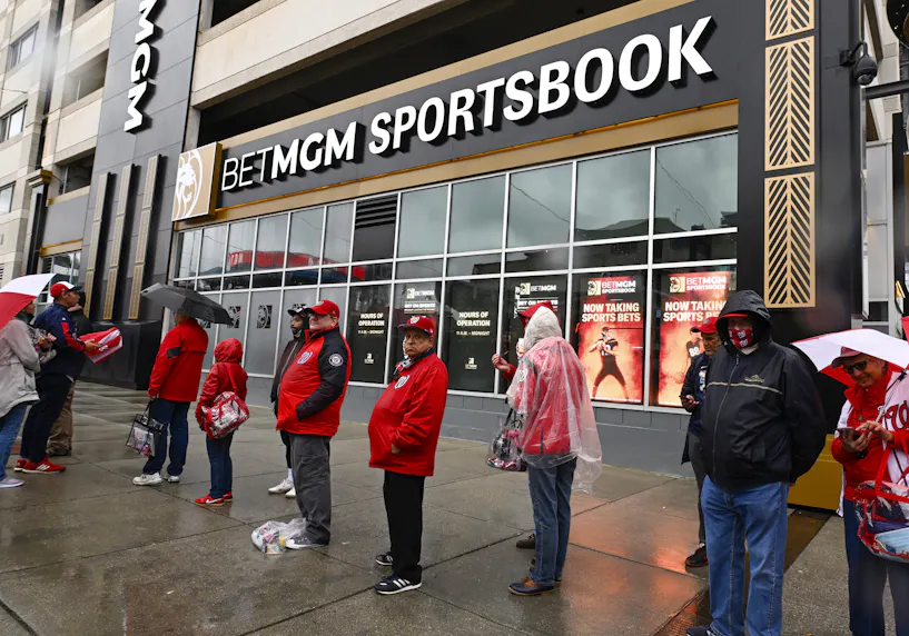 Fans wait to enter stadium next to BetMGM sportsbook as we look at the new single digital wallet for Nevada bettors