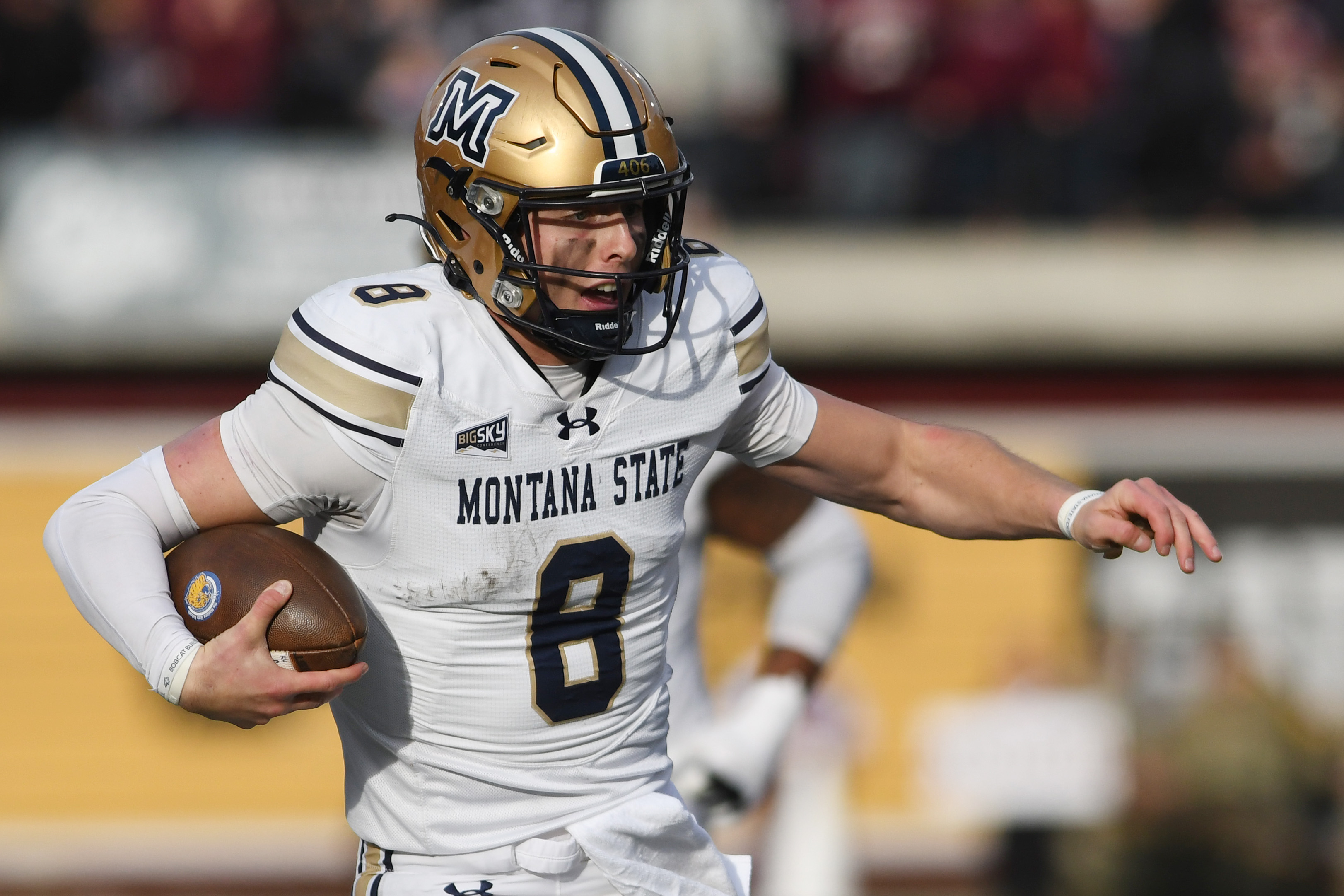 Montana State Bobcats quarterback Justin Lamson (8), seen here carrying the ball, is featured in our Illinois State vs. Montana State predictions and odds.