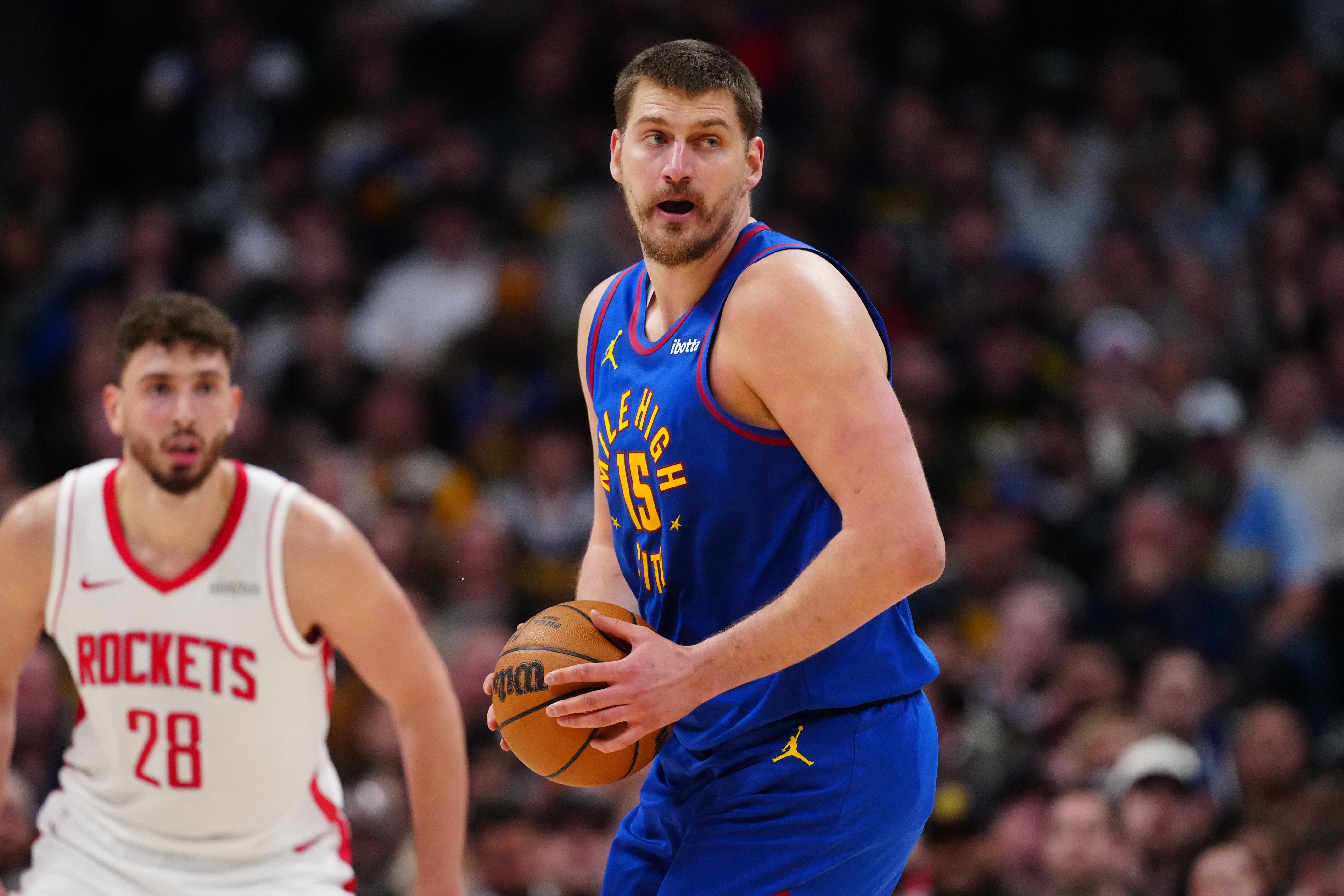  Denver Nuggets center Nikola Jokic (15) controls the ball as we break down our NBA Play of the Day.