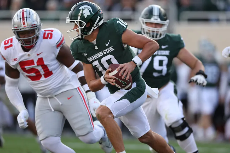Payton Thorne #10 of the Michigan State Spartans plays against the Ohio State Buckeyes at Spartan Stadium on Oct. 8. 