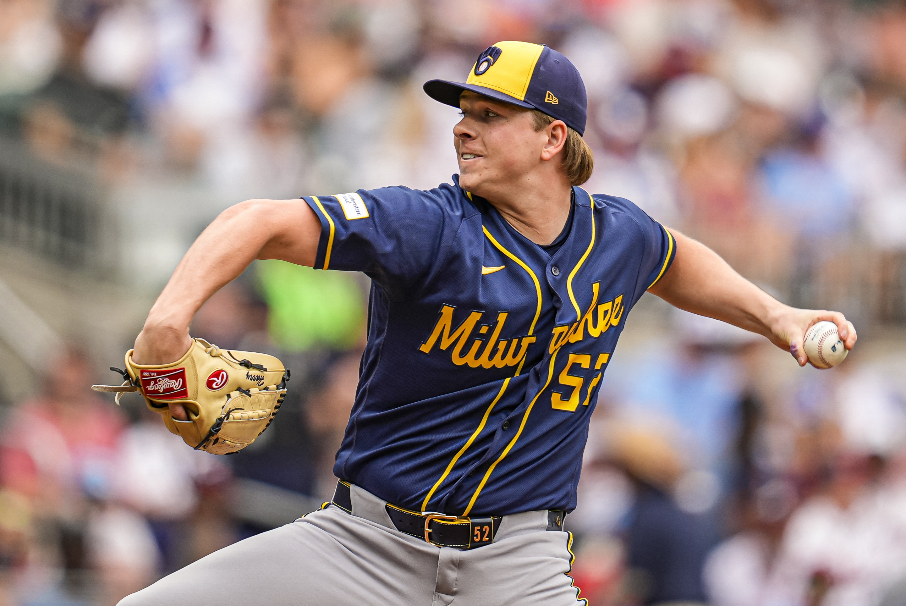 Milwaukee Brewers pitcher Kyle Harrison (52) pitches as he is featured in our Brewers vs. Diamondbacks win probability.