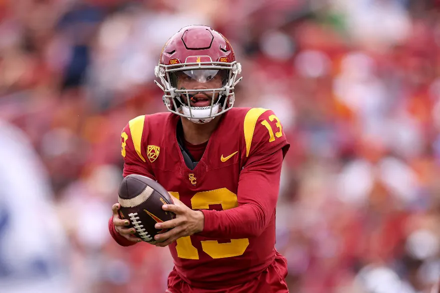 Caleb Williams #13 of the USC Trojans looks to pass the ball as we look at our college football Week 2 predictions