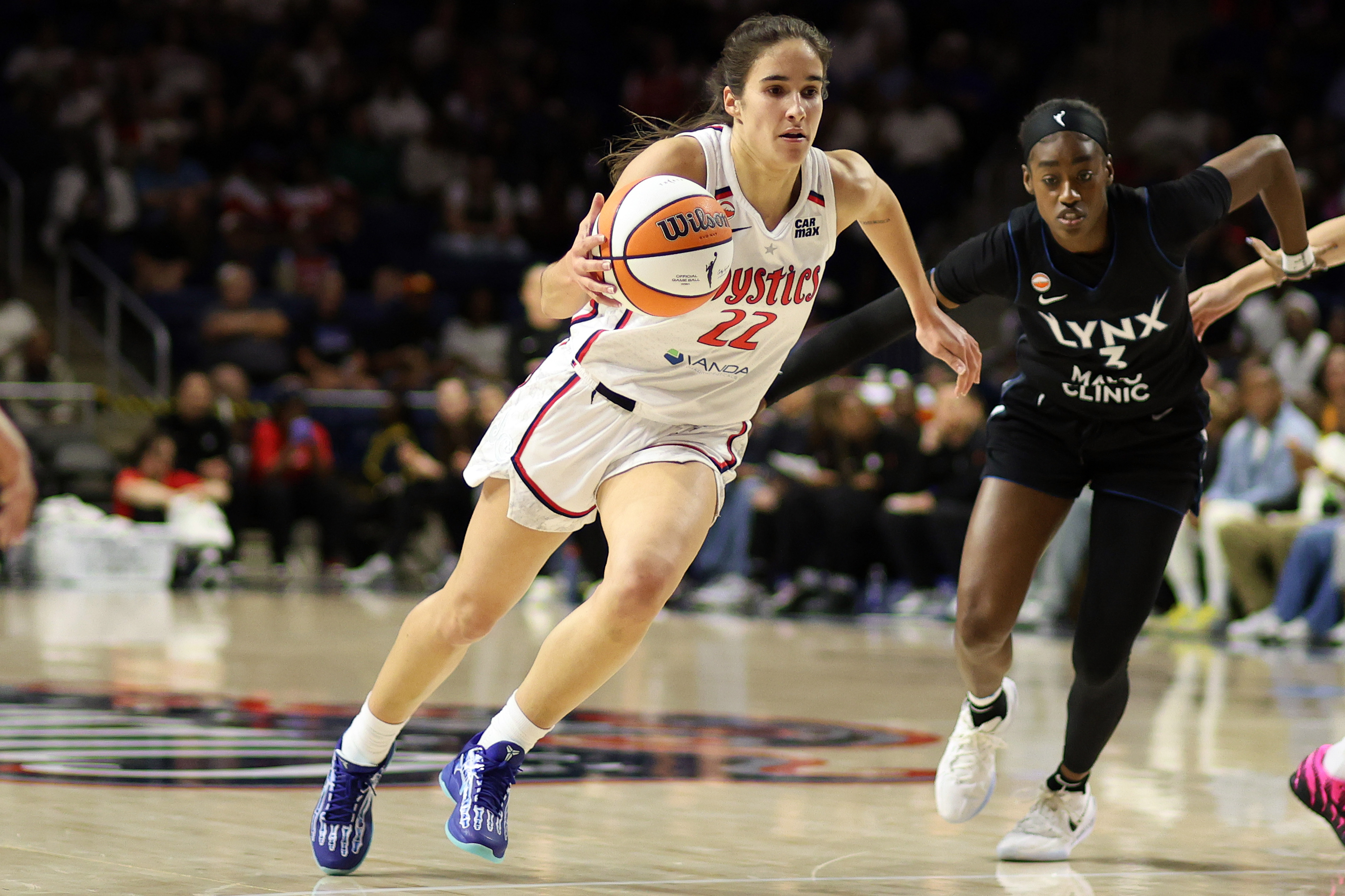 Washington Mystics guard Sonia Citron (22) drives as we break down our Mystics vs. Sun prediction.