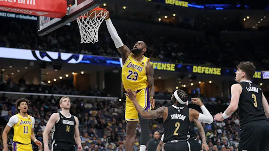 LeBron James #23 of the Los Angeles Lakers goes to the basket as we look at our Lakers vs. Pelicans player props