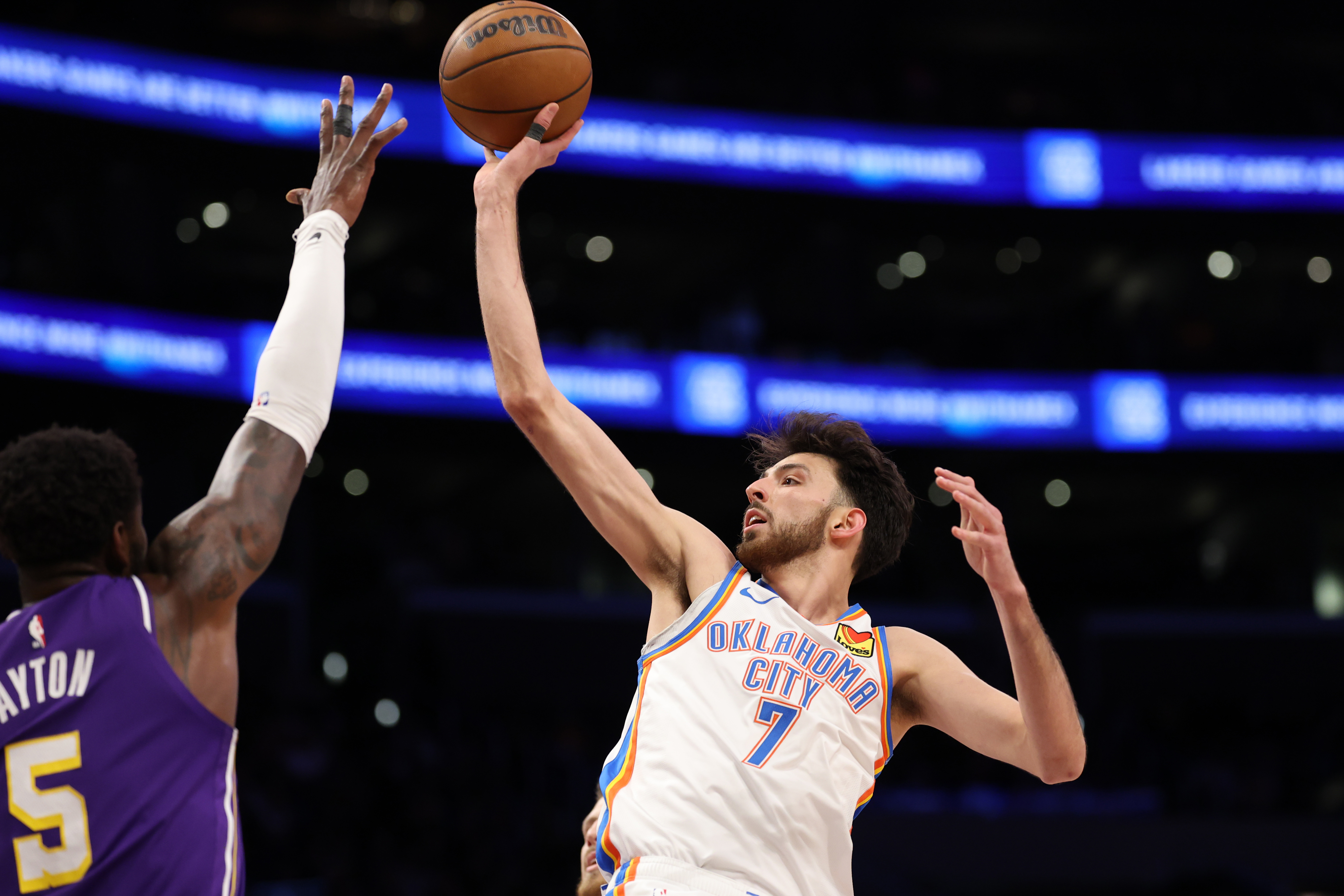 Oklahoma City Thunder center Chet Holmgren - who's featured in my NBA player props today - shoots the ball. 