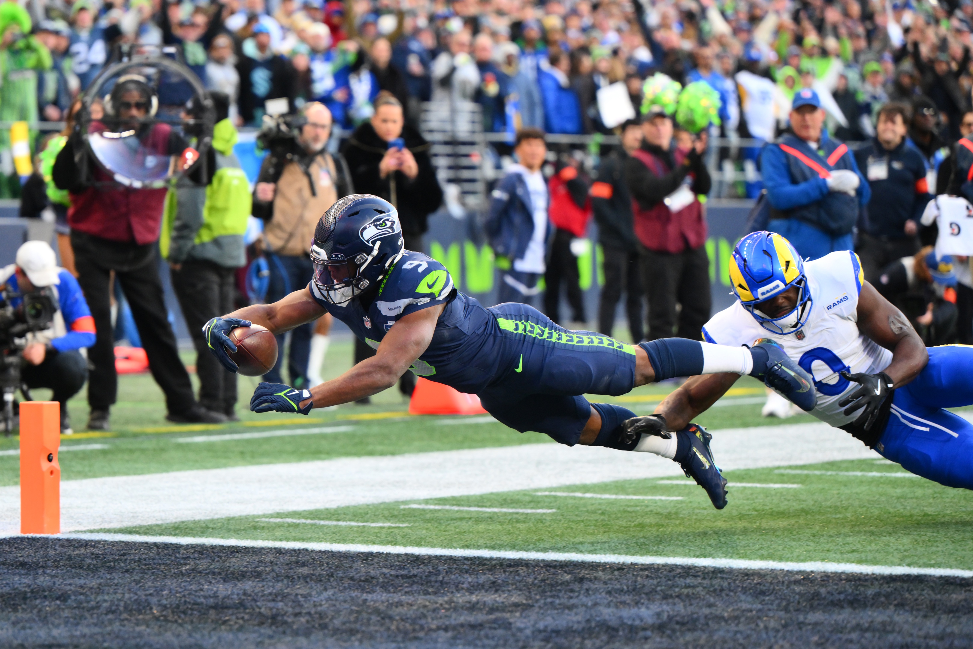 Seattle Seahawks running back Kenneth Walker III - who's featured in my Super Bowl prediction - reaches for a touchdown. 