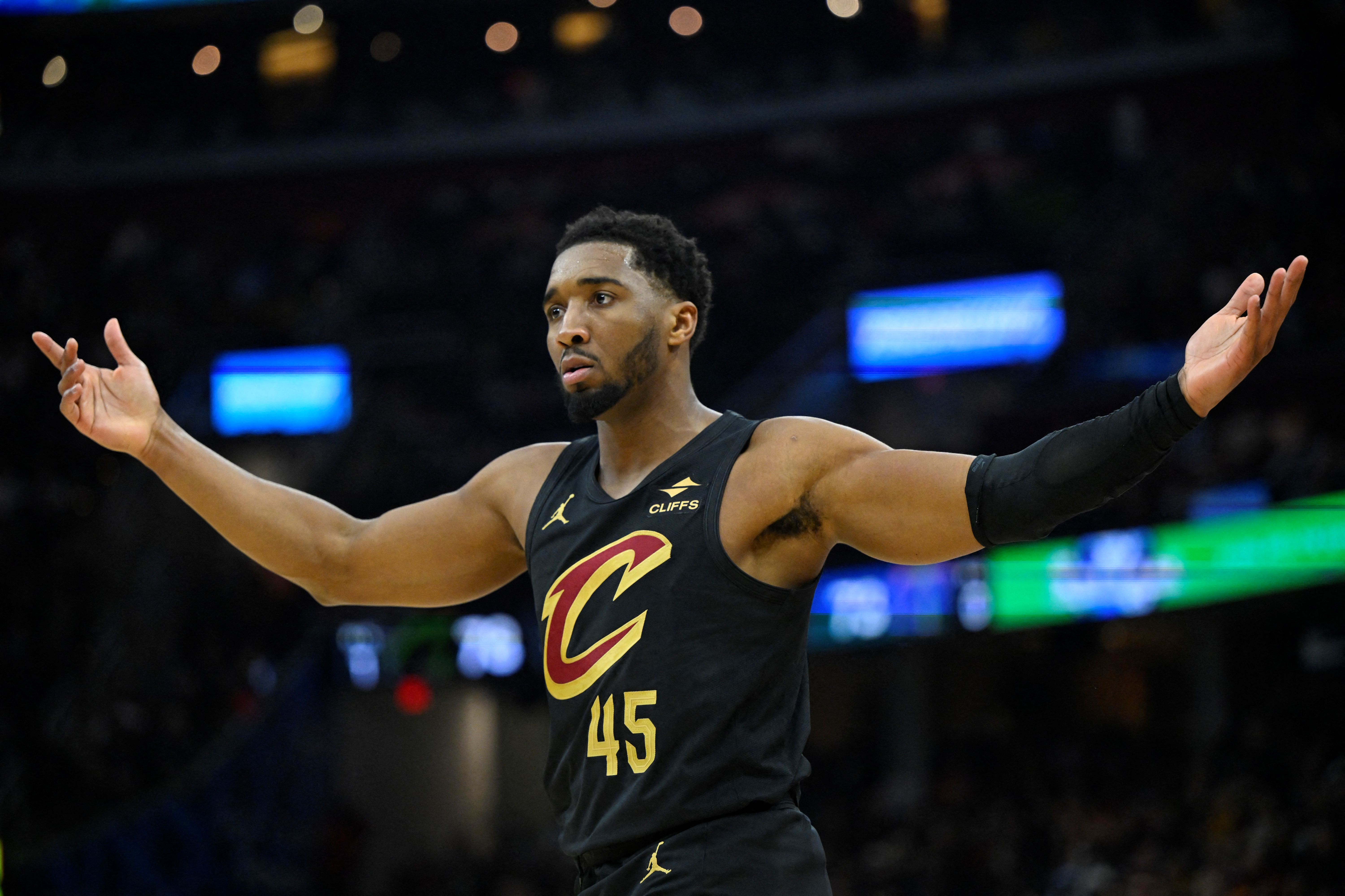 Cleveland Cavaliers guard Donovan Mitchell reacts as we offer our top NBA player props & best bets.